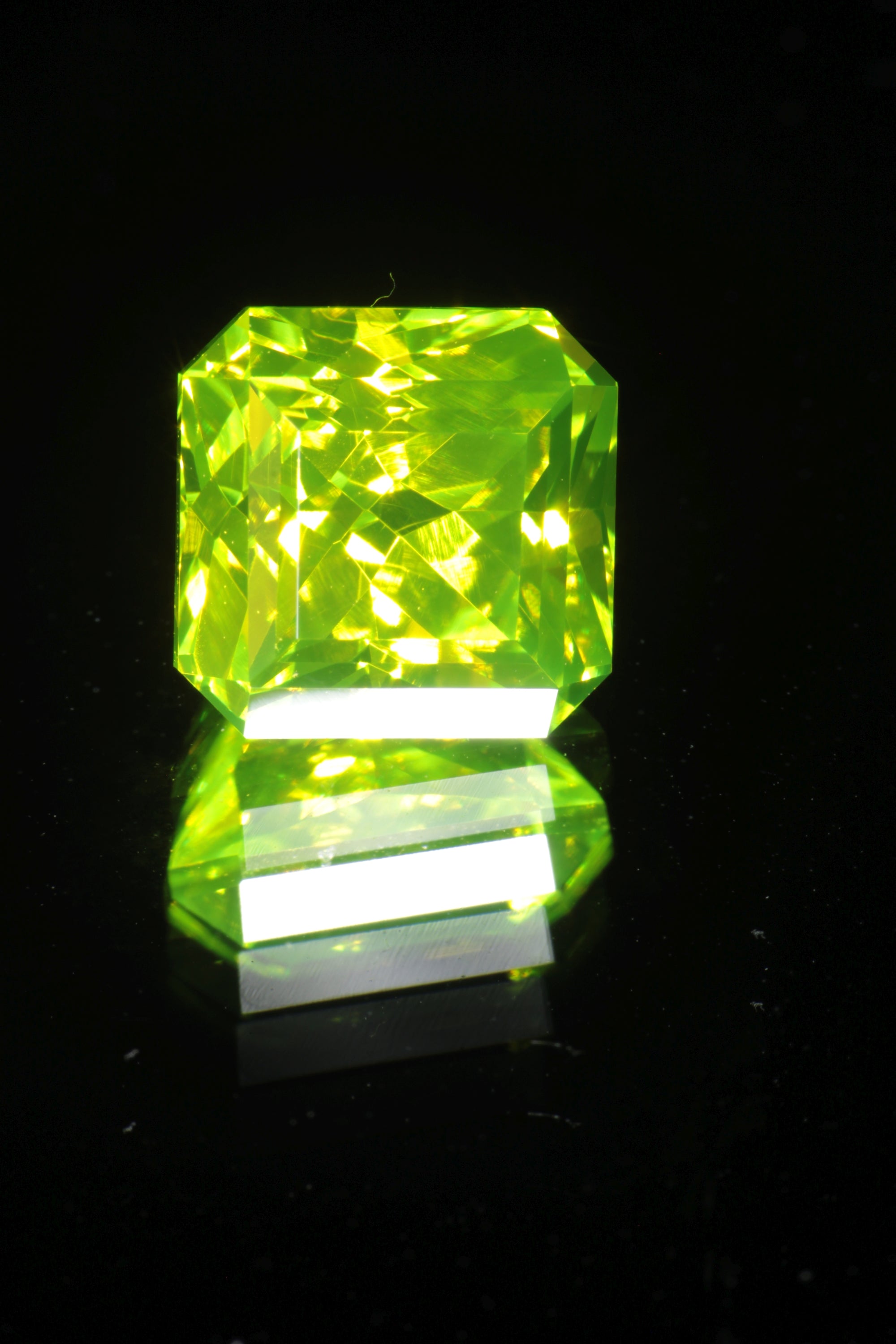 Green glowing LuAG lumogarnet gemstones