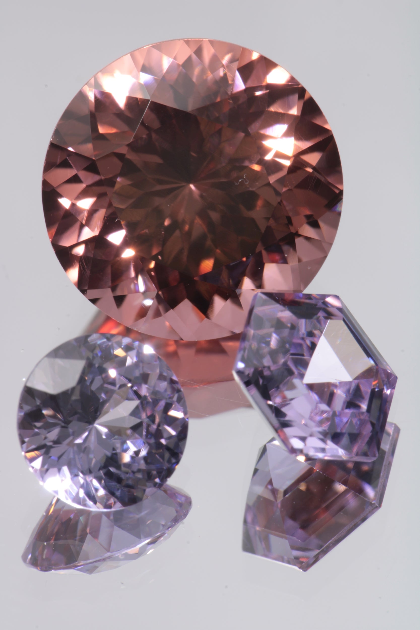 Lab Perovskite Cut Gems, Pink to Orange Red Laser YAP