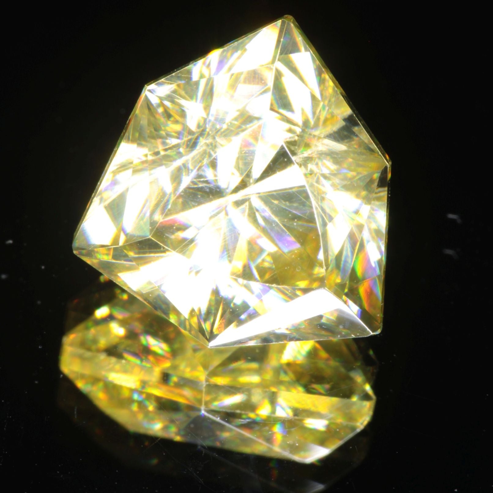 Faceted Wakefieldite Yellow Trillion cut gem