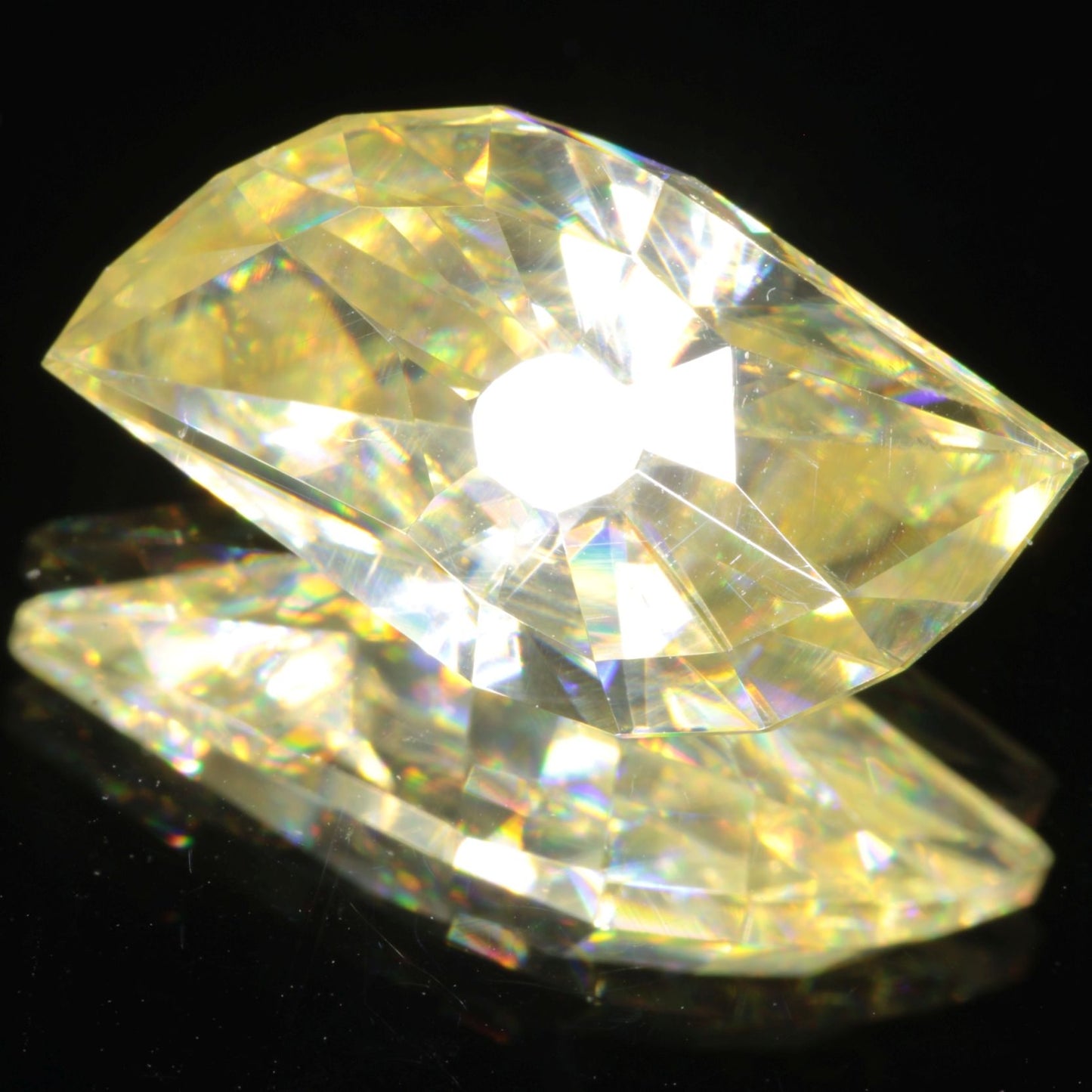 Faceted Wakefieldite Yellow Twist Eye cut gem