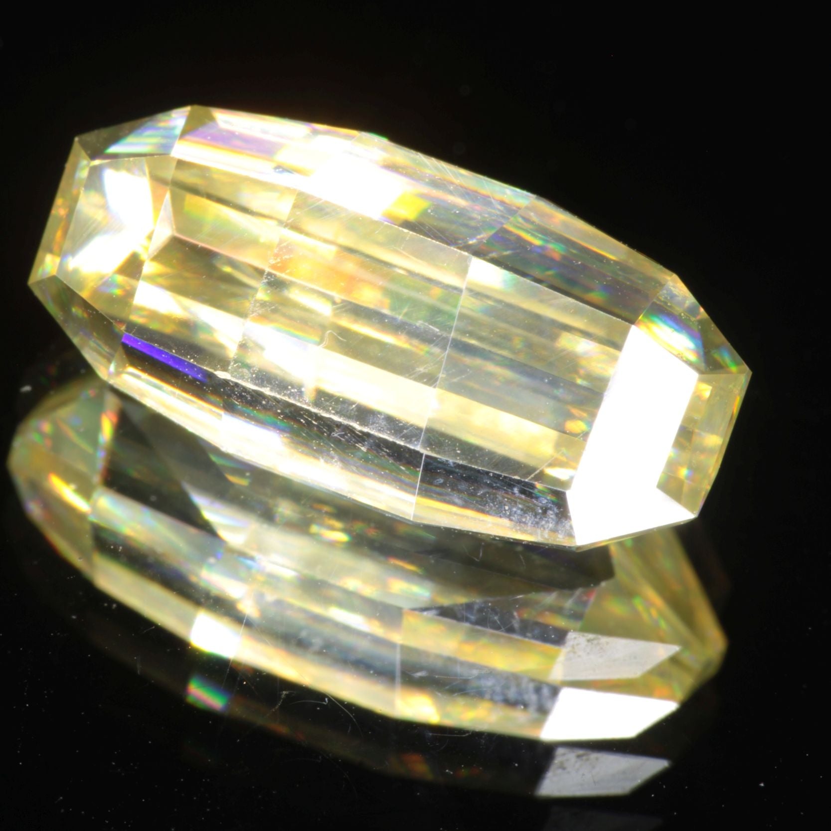 Faceted Wakefieldite Yellow Barred Oval cut gem
