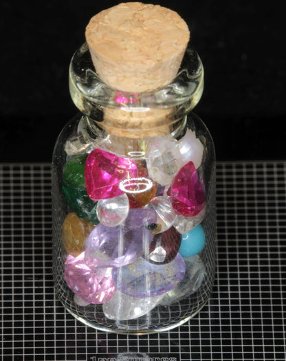 Gem Vials: Natural Kornerupine, Garnet, and Tunduru stones, mixed Popout Stones and Pearls