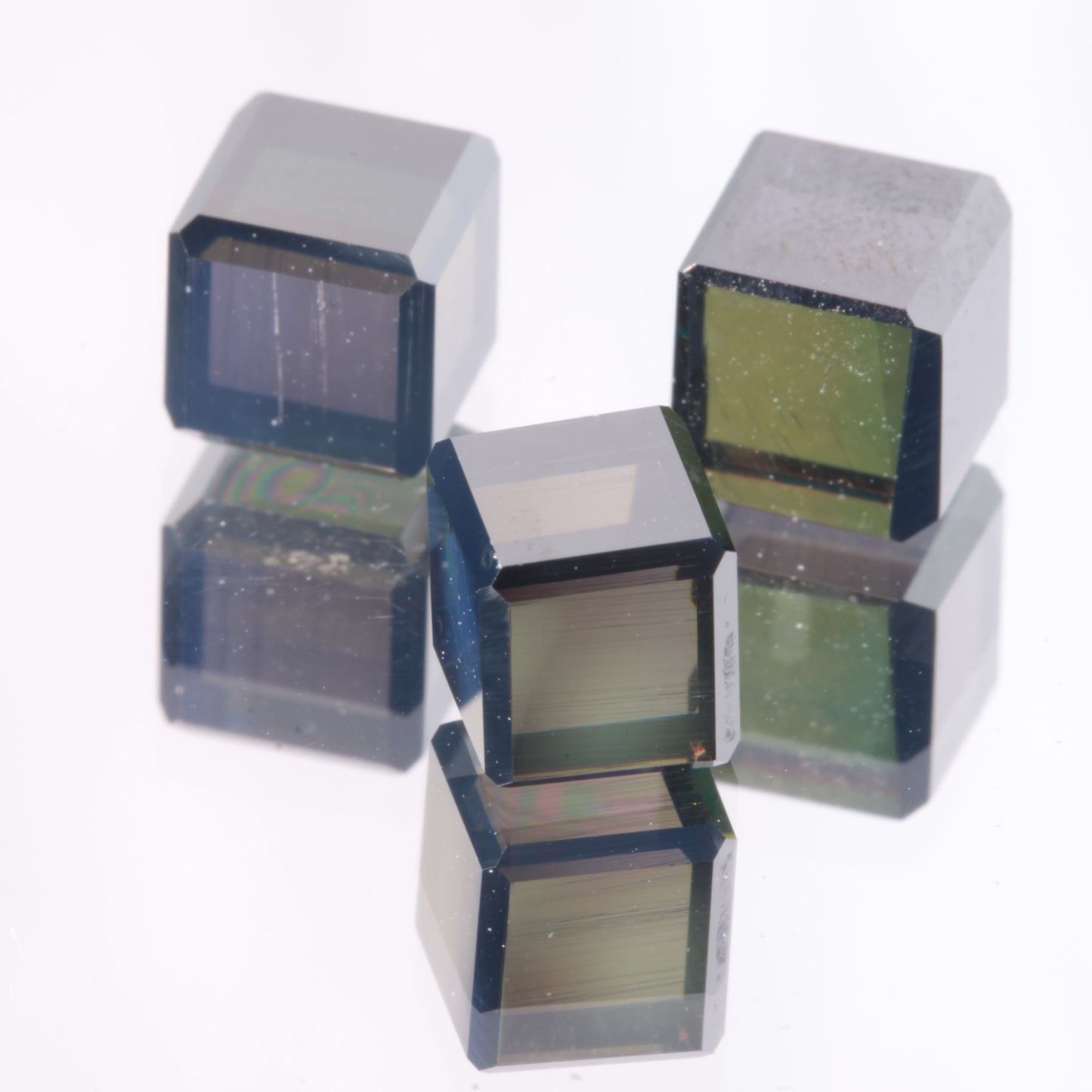 Polished Dark Dichroic Cube (Wonky) showing yellow and blue axes