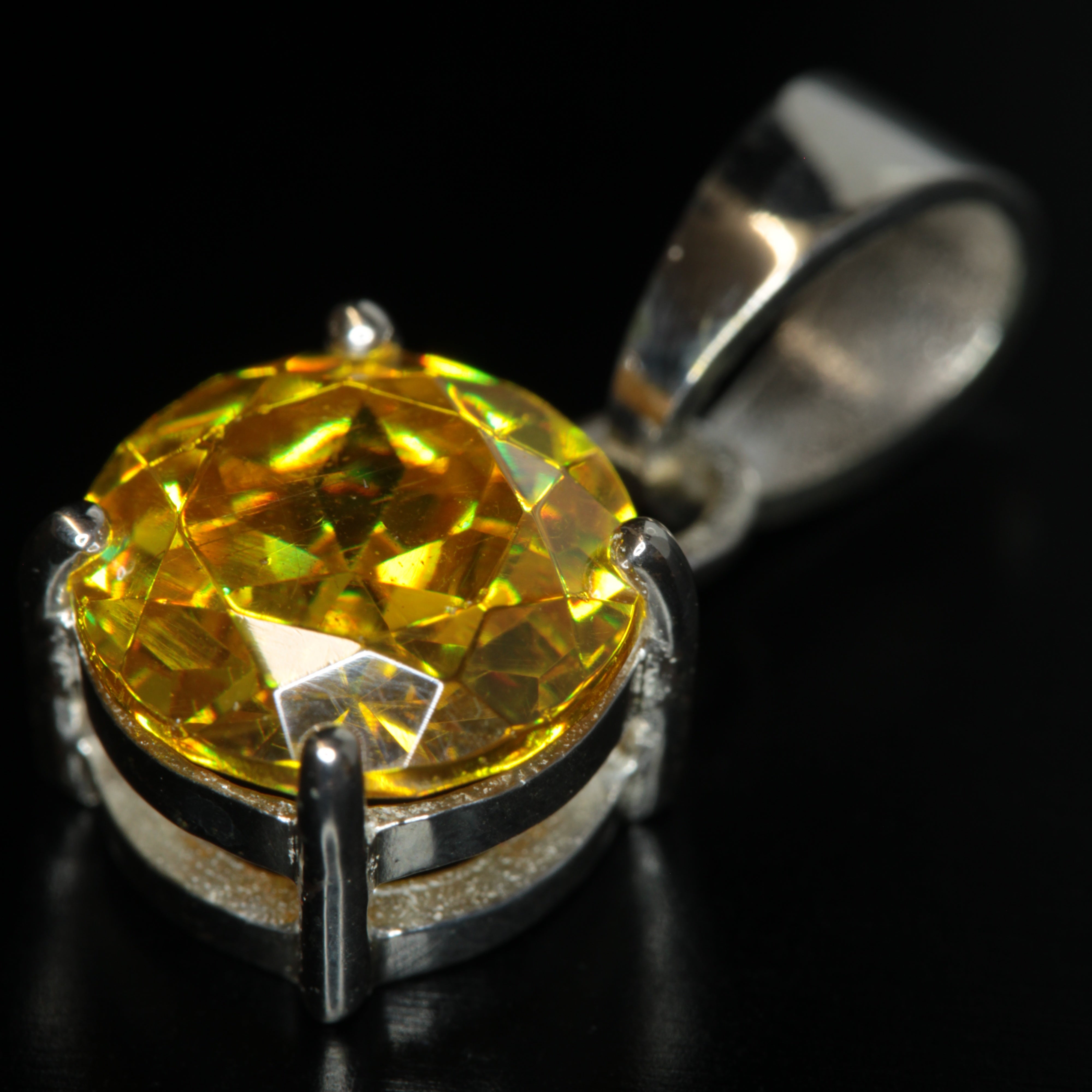 Round Cut 8mm BGO-20 Pendant on a black background