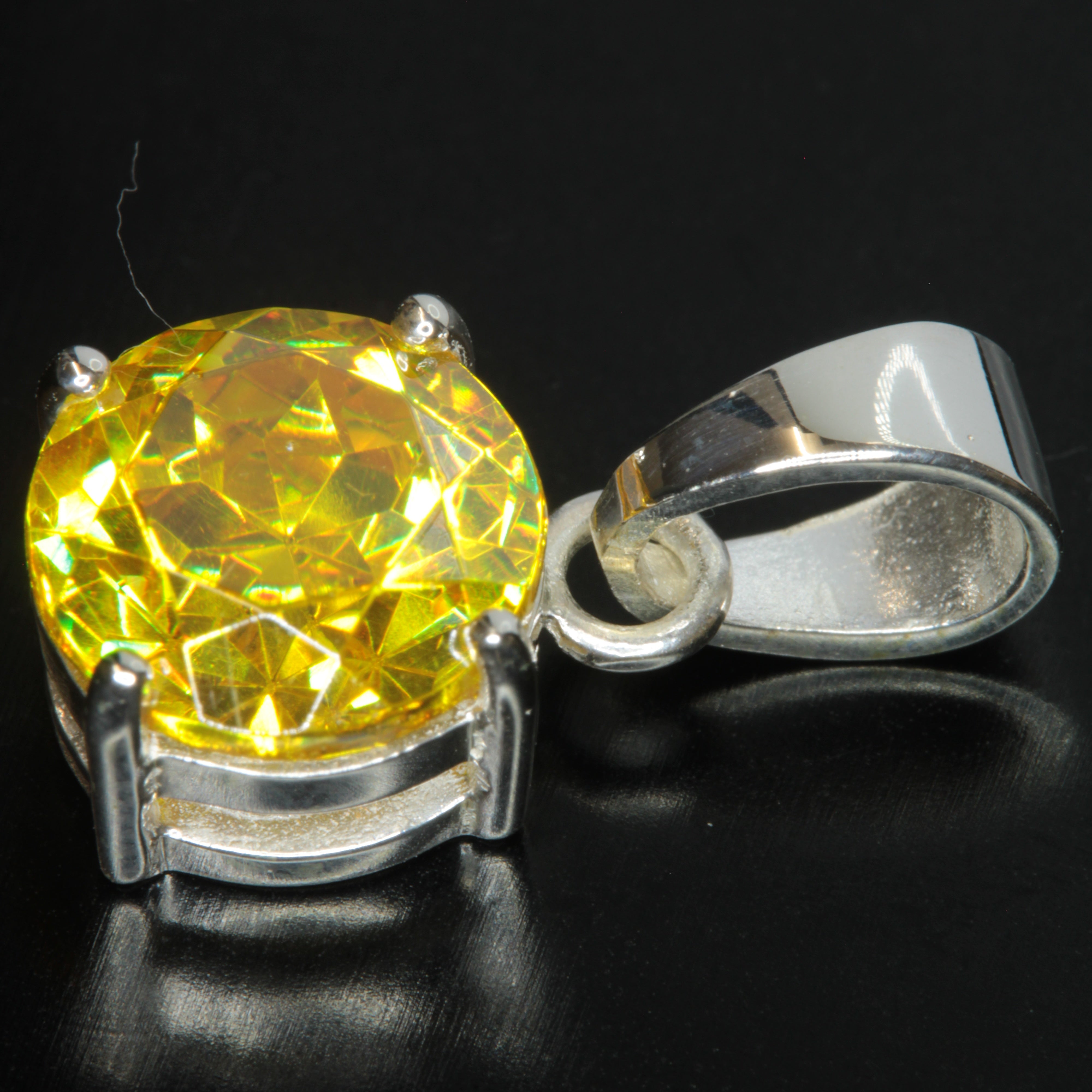 Bismuth Germanate Round Cut Pendant