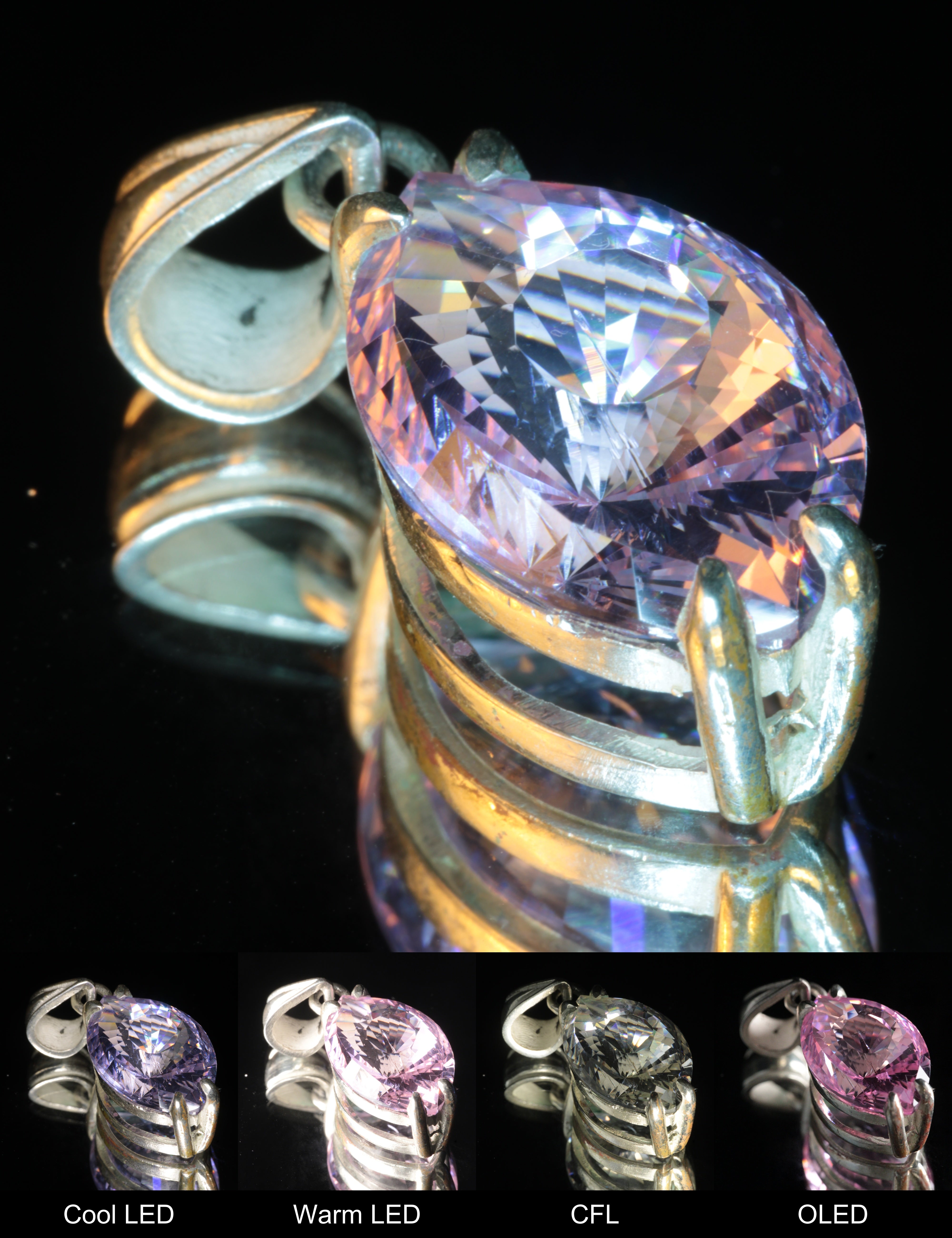 Faceted Nd:YAG Eye Pendant (Teardrop Inclusion)