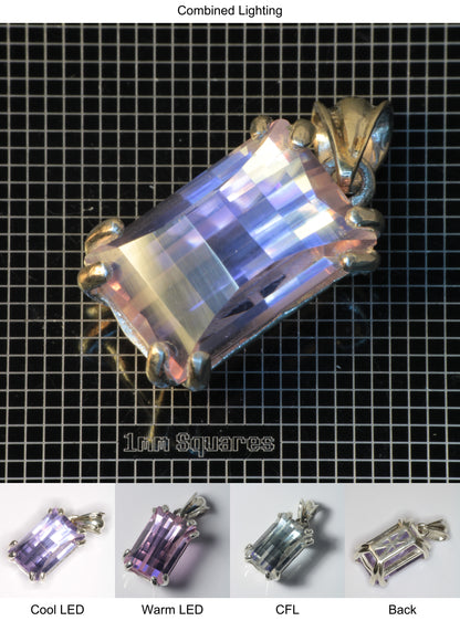 Faceted YAP:Nd Pendant containing Pixel Gemstone