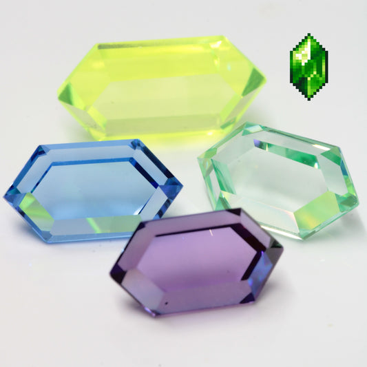 Assortment of four Long Hexagon Retrohex gemstones, along with the retro game gem sprite from Tyrian 2000 made by Daniel Cook, used with permission from his site Lostgarden.com