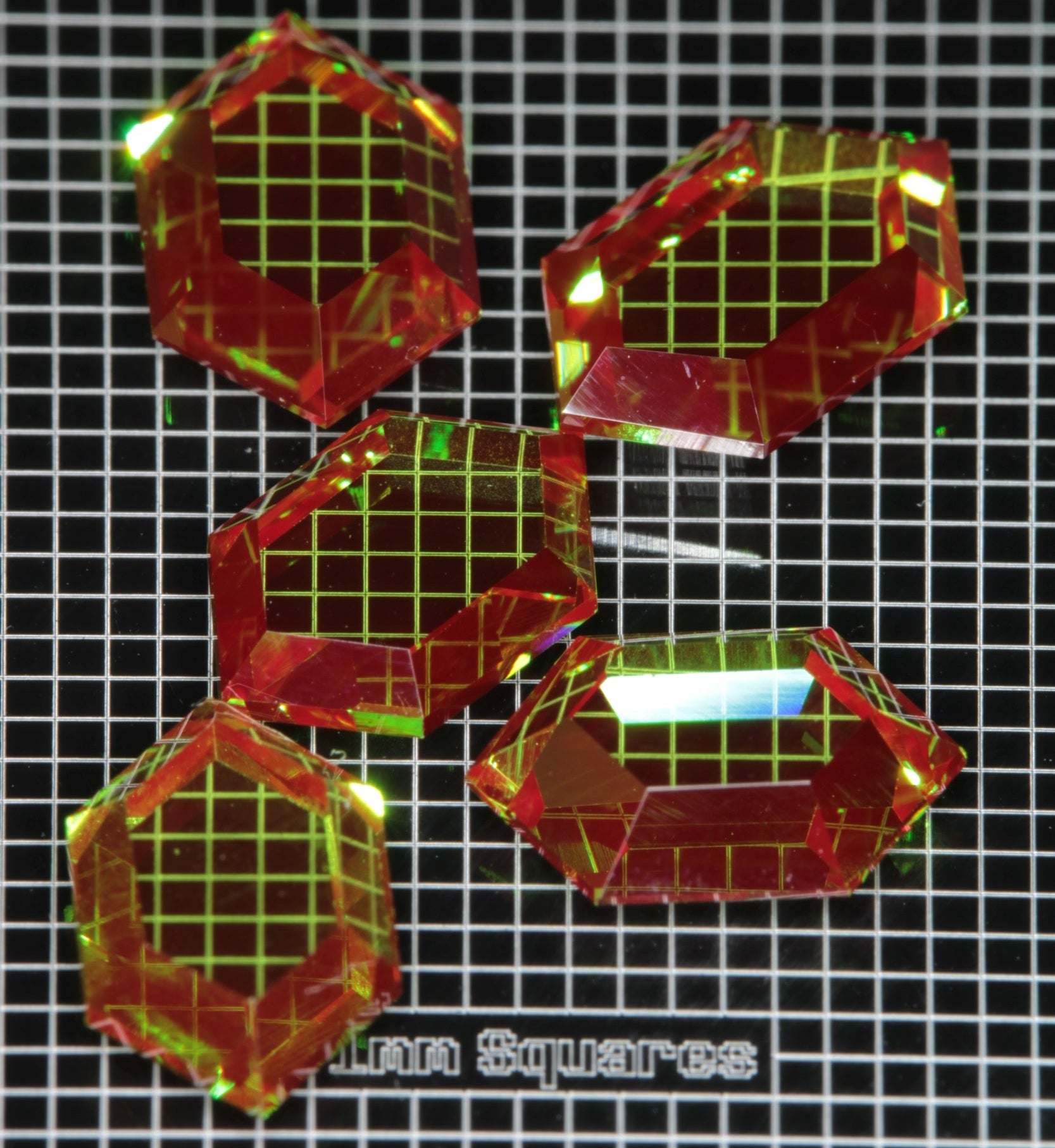 Red and Green RetroHex faceted Christmas Garnets, Chromium YAG pixel art designs.