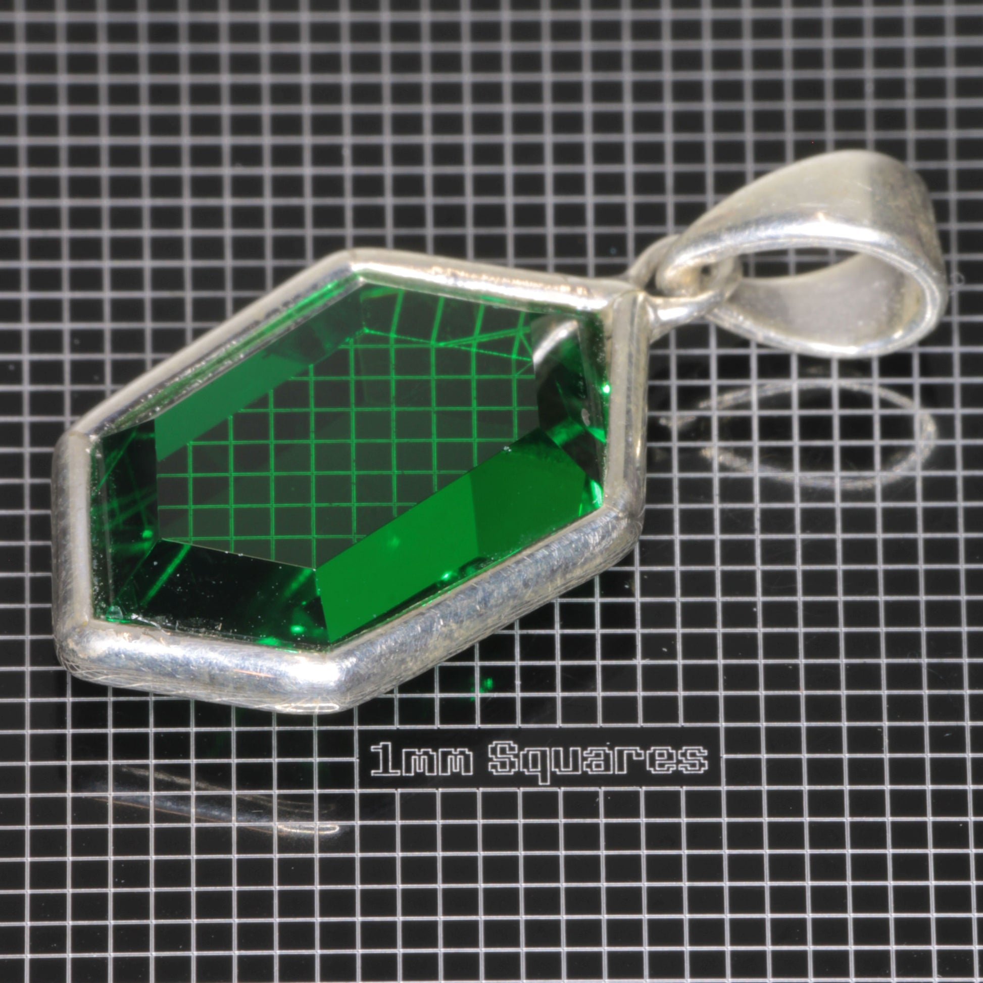 Pendant with Videogame Inspired Retrohex Gemstone made of CTH:YAG synthetic garnet