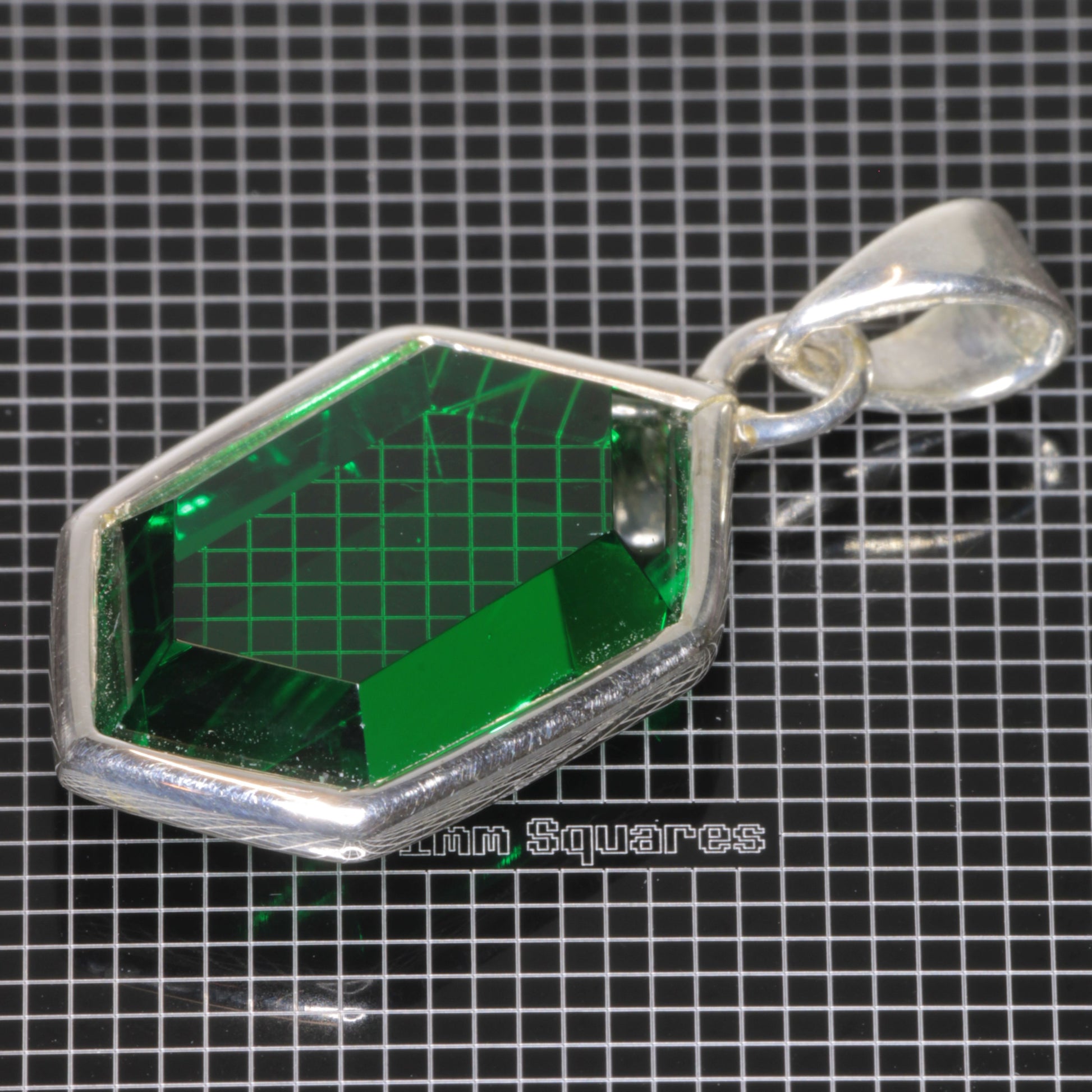 Pendant with Videogame Inspired Retrohex Gemstone made of CTH:YAG synthetic garnet