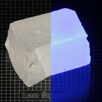 Block of LSO Gem Rough on a dark background, split between normal light (left) and UV (right) to show blue fluorescent glow.