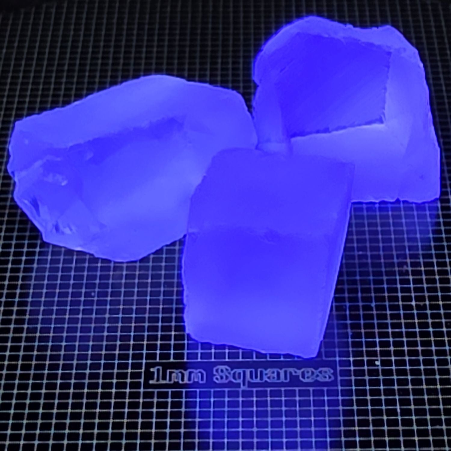 Fluorite Gem Rough Glowing Blue Under UV Light