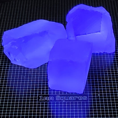 Fluorite Gem Rough Glowing Blue Under UV Light