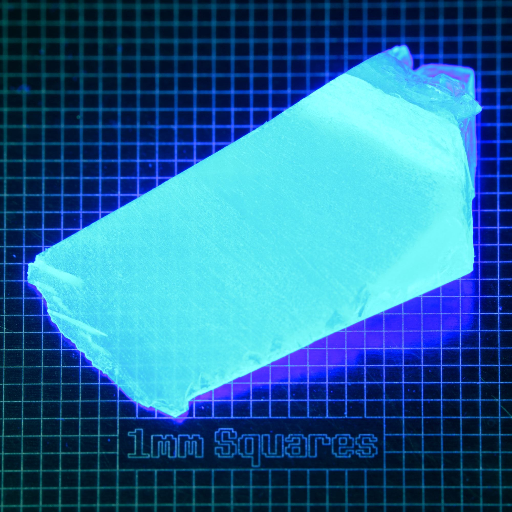Blue Glowing Europium Fluorite Thin Wedge Gem Rough, Fluorescing under 365nm UV