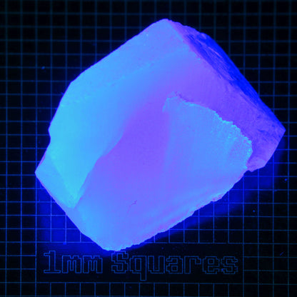 Blue Glowing Europium Fluorite Triangular Chunk Gem Rough, Fluorescing under 365nm UV