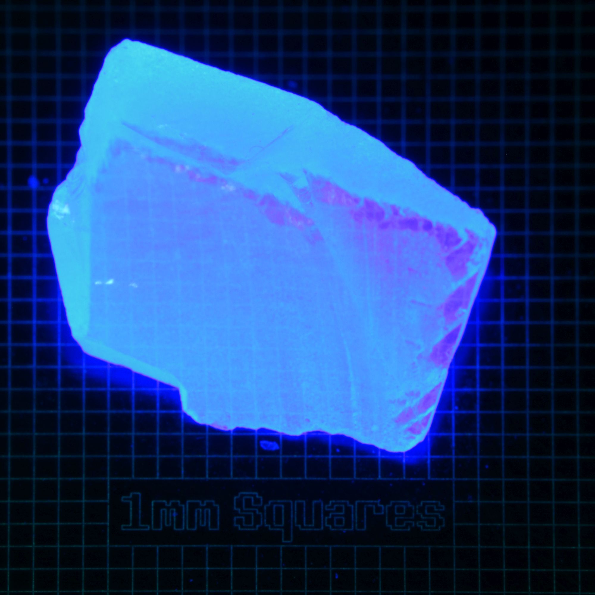 Blue Glowing Europium Fluorite Prism (Cleaved) Gem Rough, Fluorescing under 365nm UV