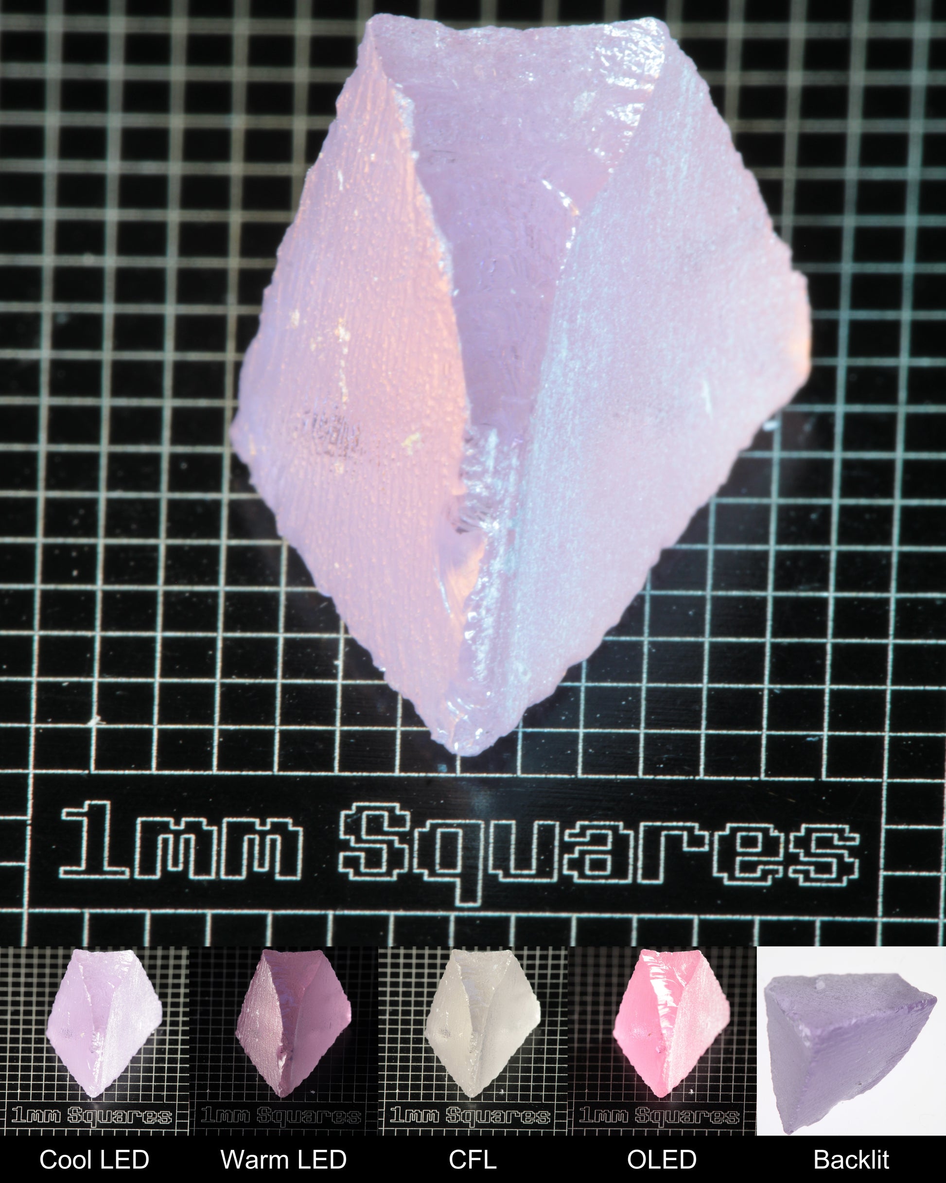 Nd:GGG Wedge Gem Rough Under Multiple Lights Showing the Color Change