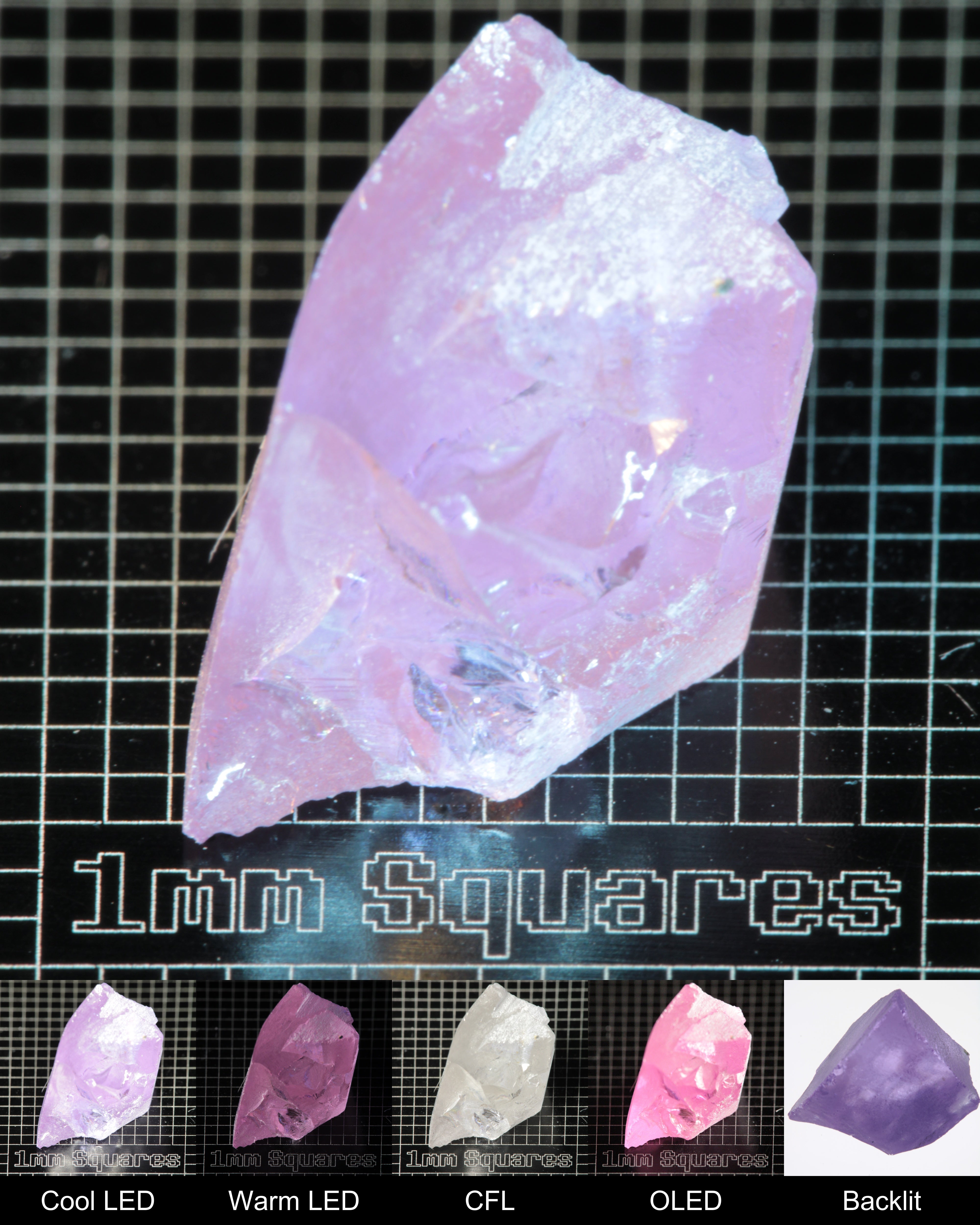 Nd:GGG Chunk Gem Rough Under Multiple Lights Showing the Color Change