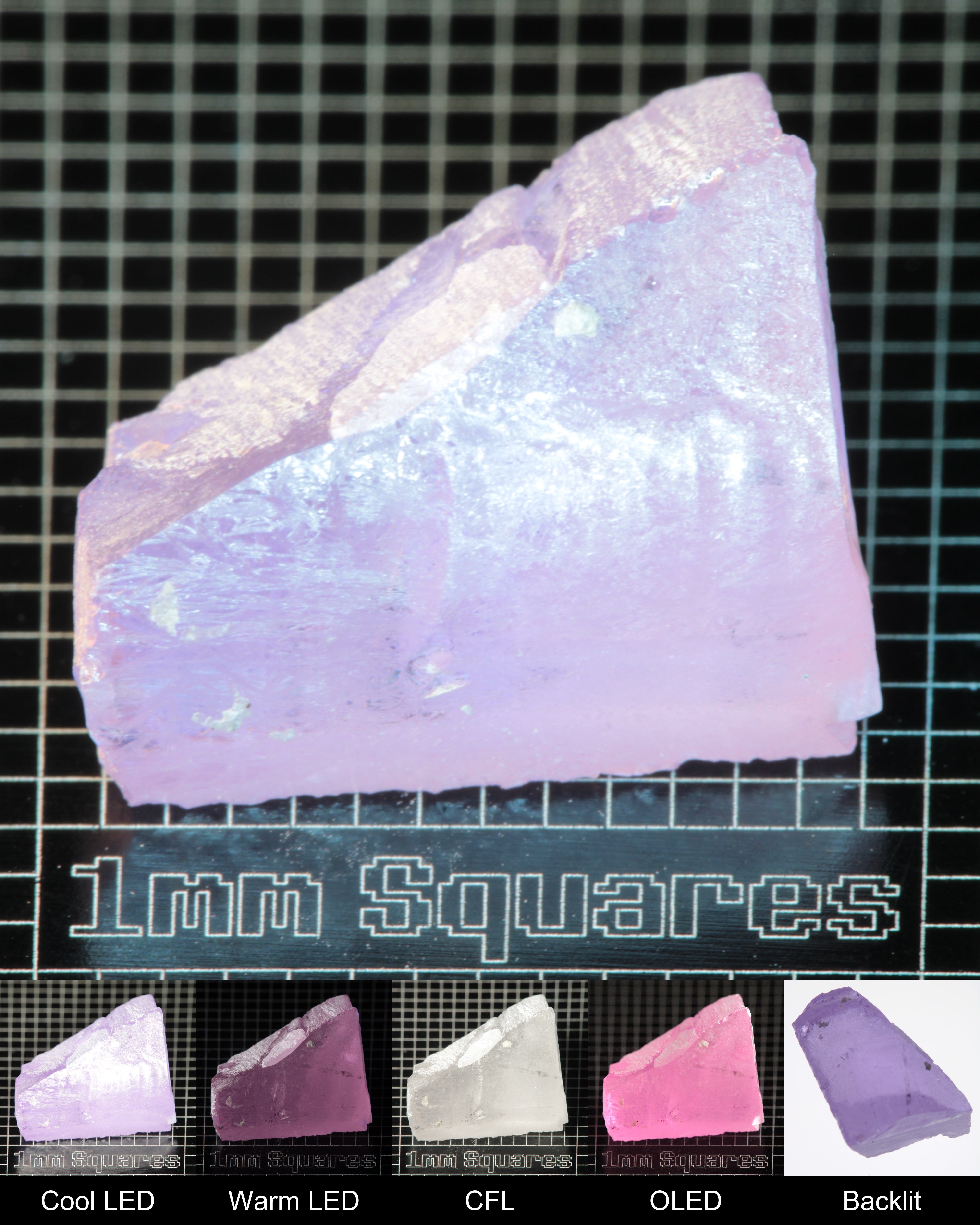 Nd:GGG Edge Gem Rough Under Multiple Lights Showing the Color Change