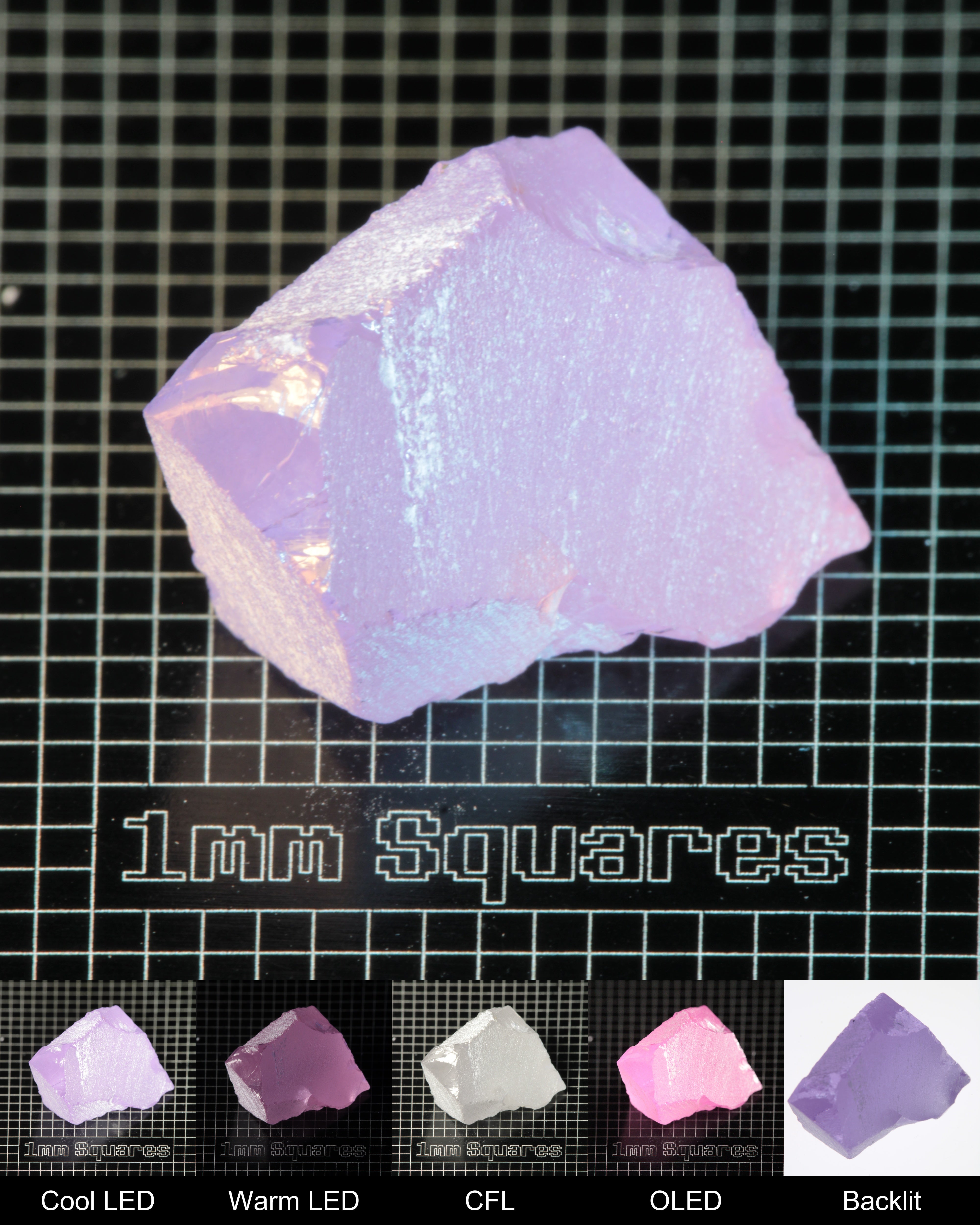 Nd:GGG Wedge Gem Rough Under Multiple Lights Showing the Color Change