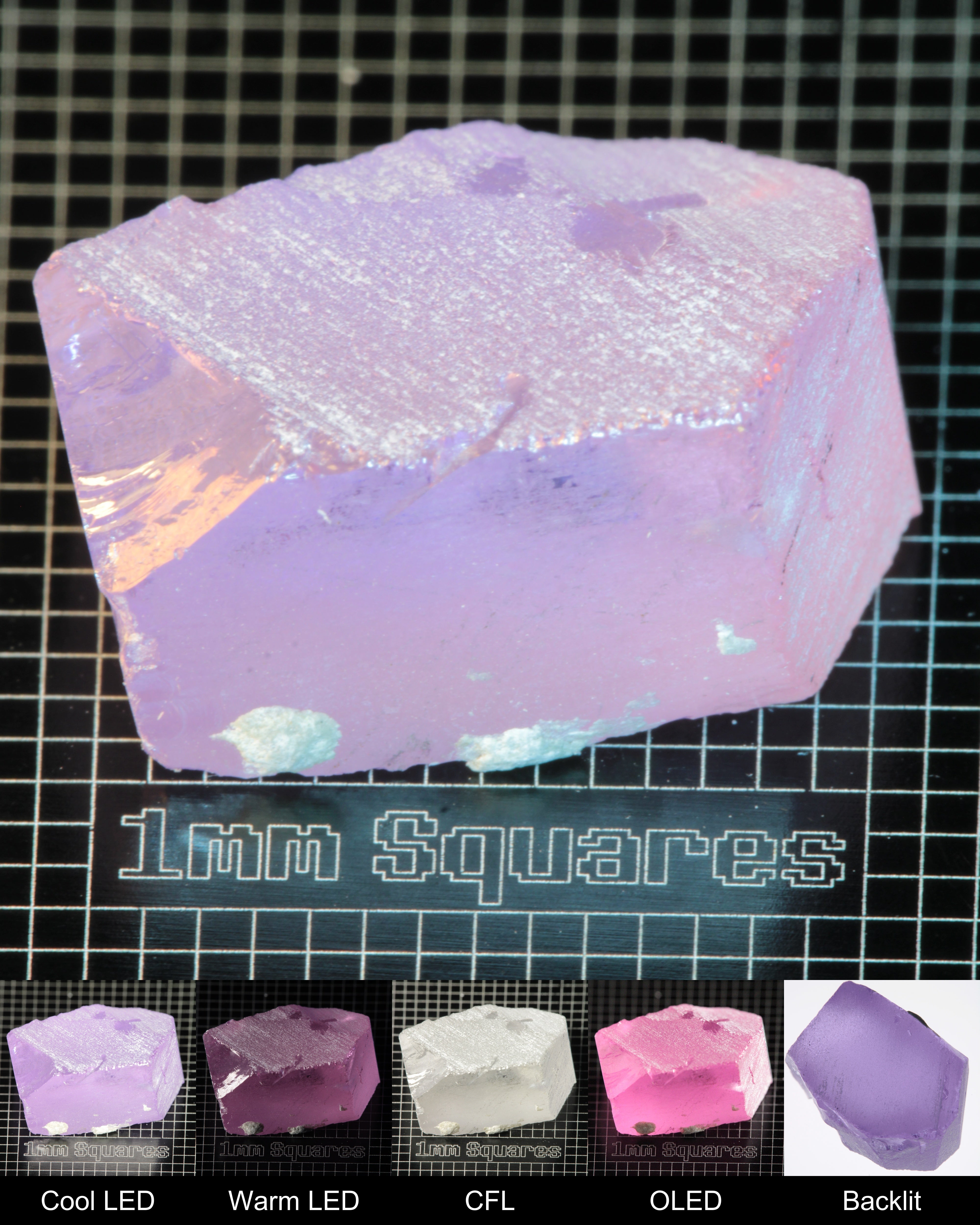 Nd:GGG Chunk Gem Rough Under Multiple Lights Showing the Color Change