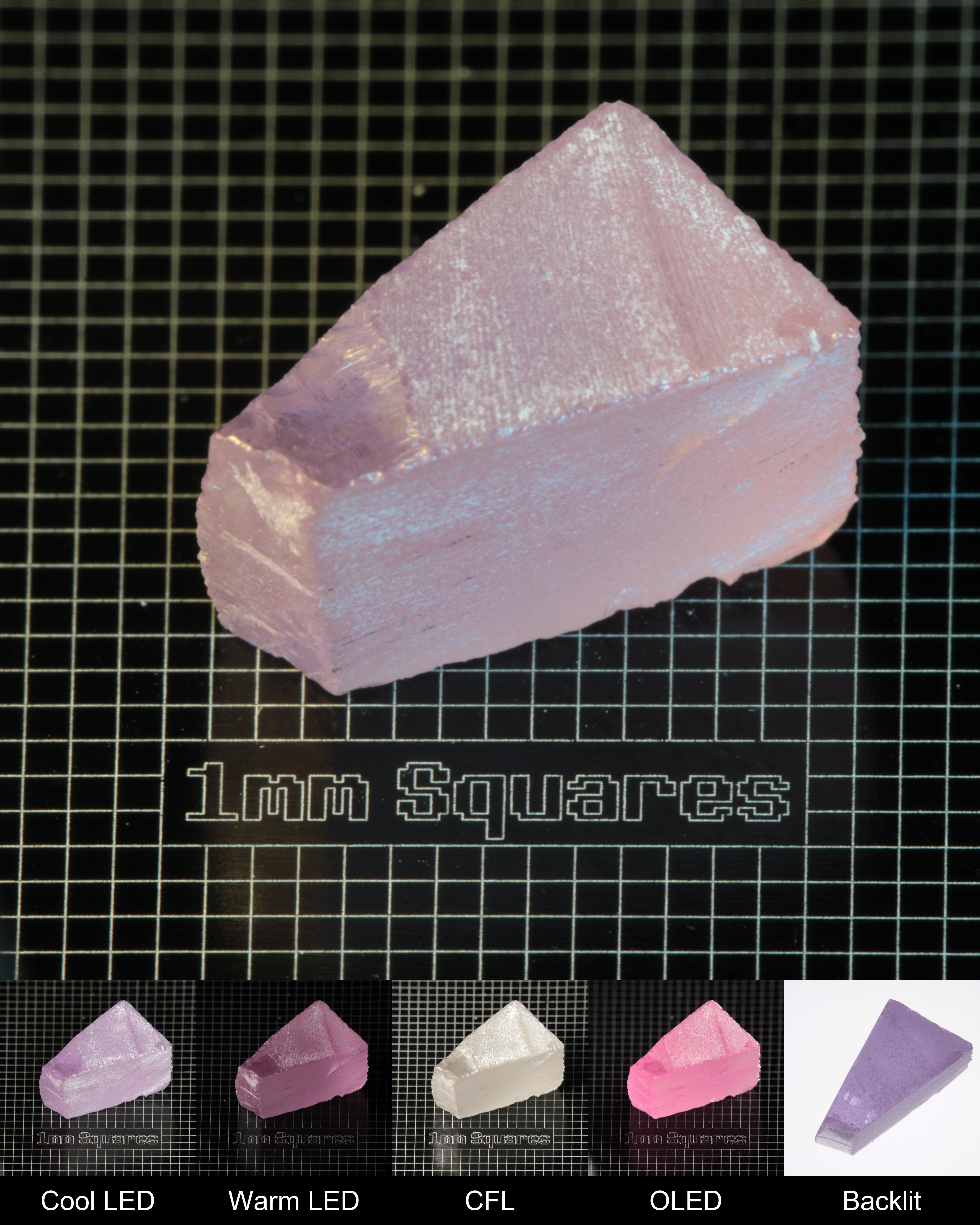 Nd:GGG Angled Block Gem Rough Under Multiple Lights Showing the Color Change