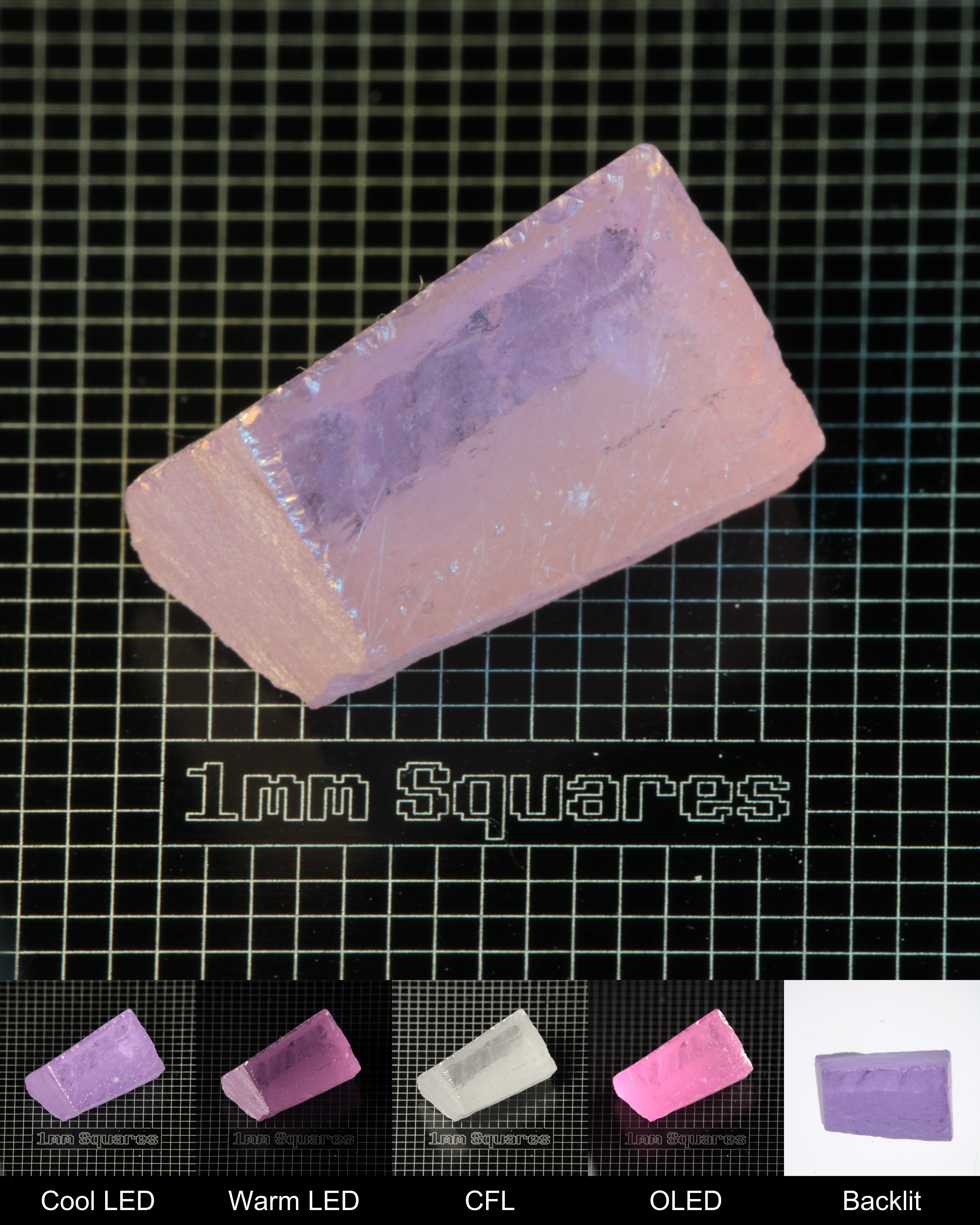 Nd:GGG Block Gem Rough Under Multiple Lights Showing the Color Change