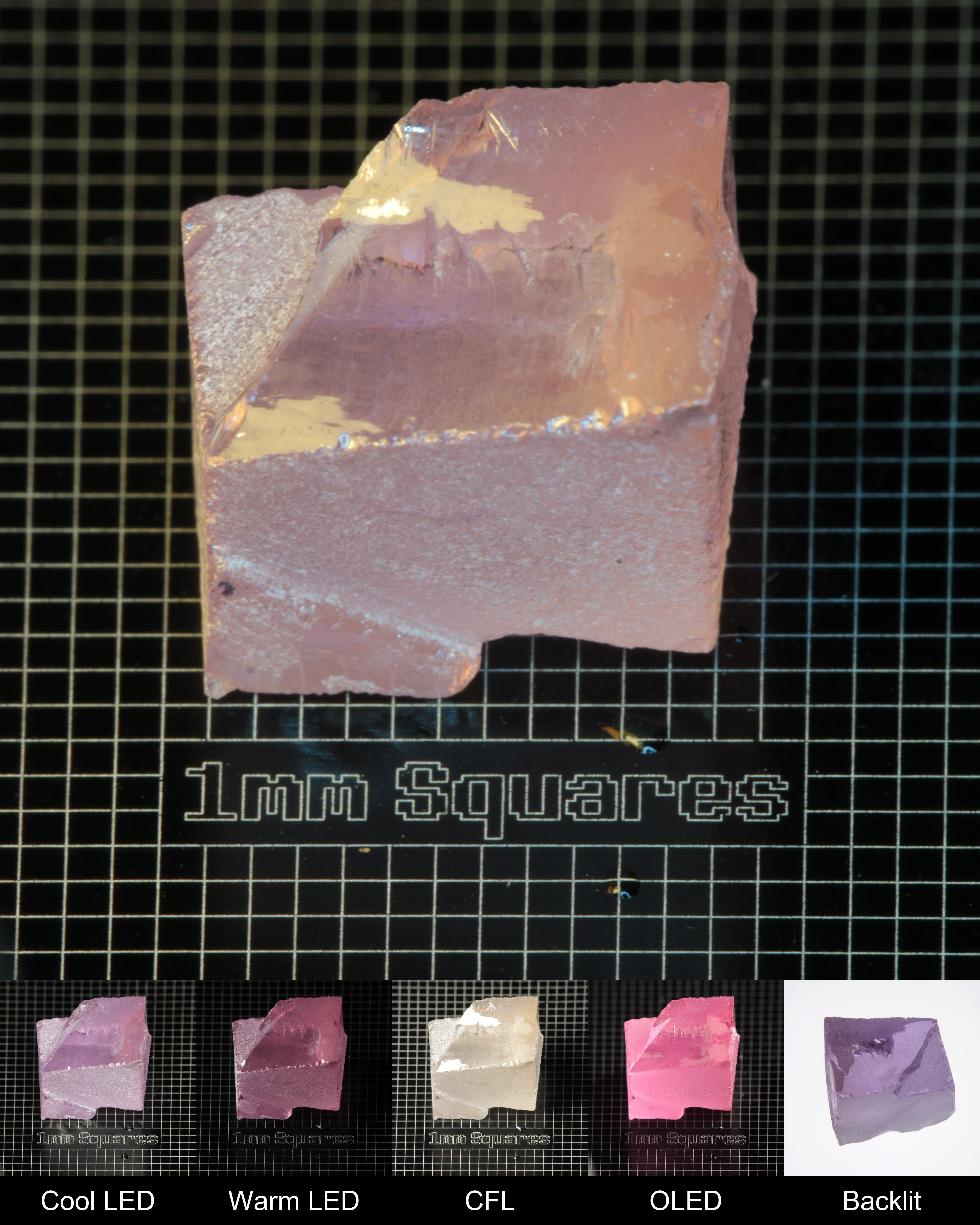 Nd:GGG Block Gem Rough Under Multiple Lights Showing the Color Change