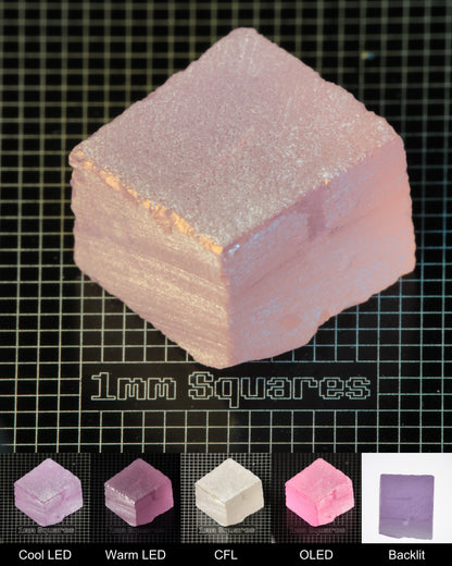 Nd:GGG Block (Surface Crack) Gem Rough Under Multiple Lights Showing the Color Change