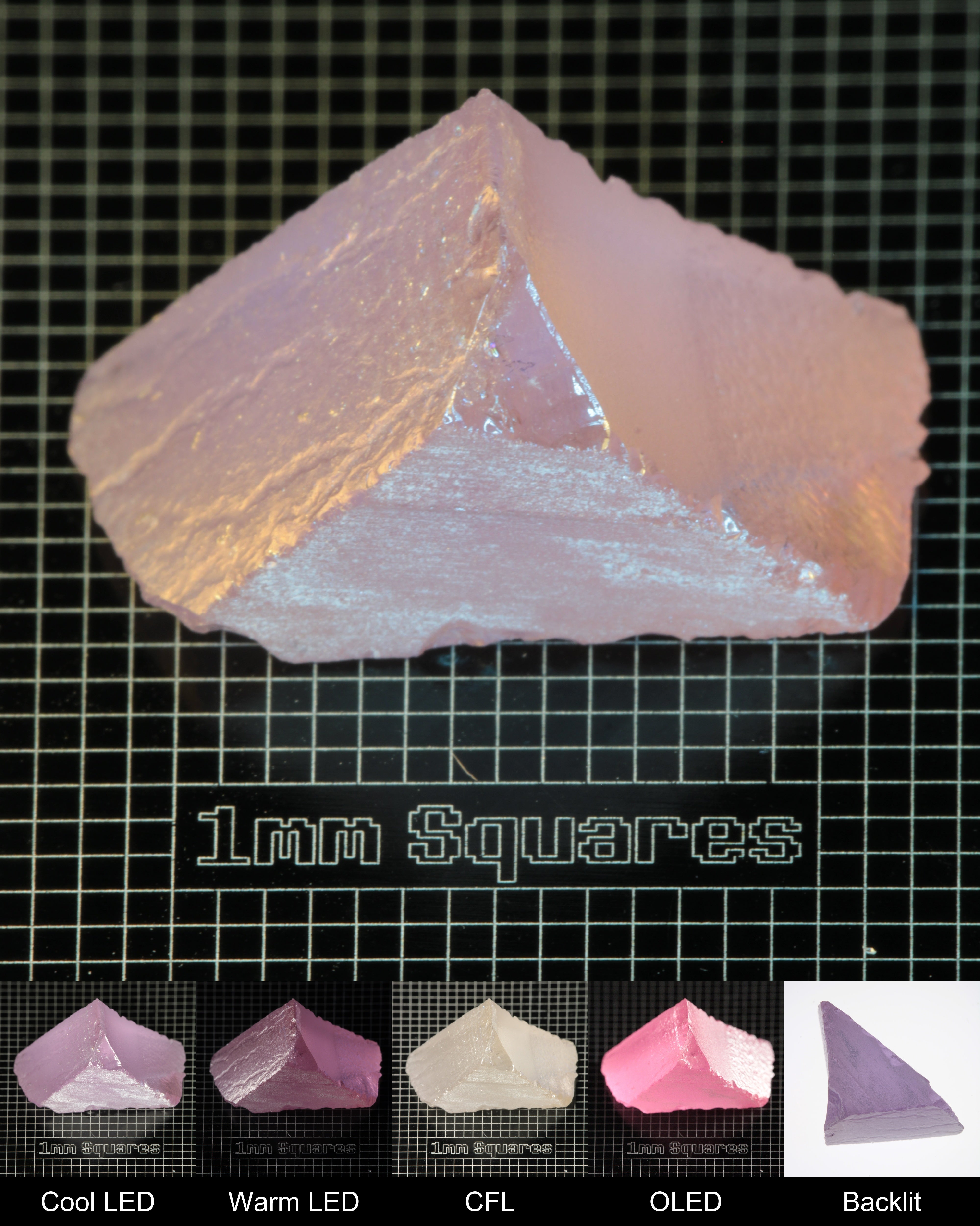 Nd:GGG Triangular Wedge Gem Rough Under Multiple Lights Showing the Color Change