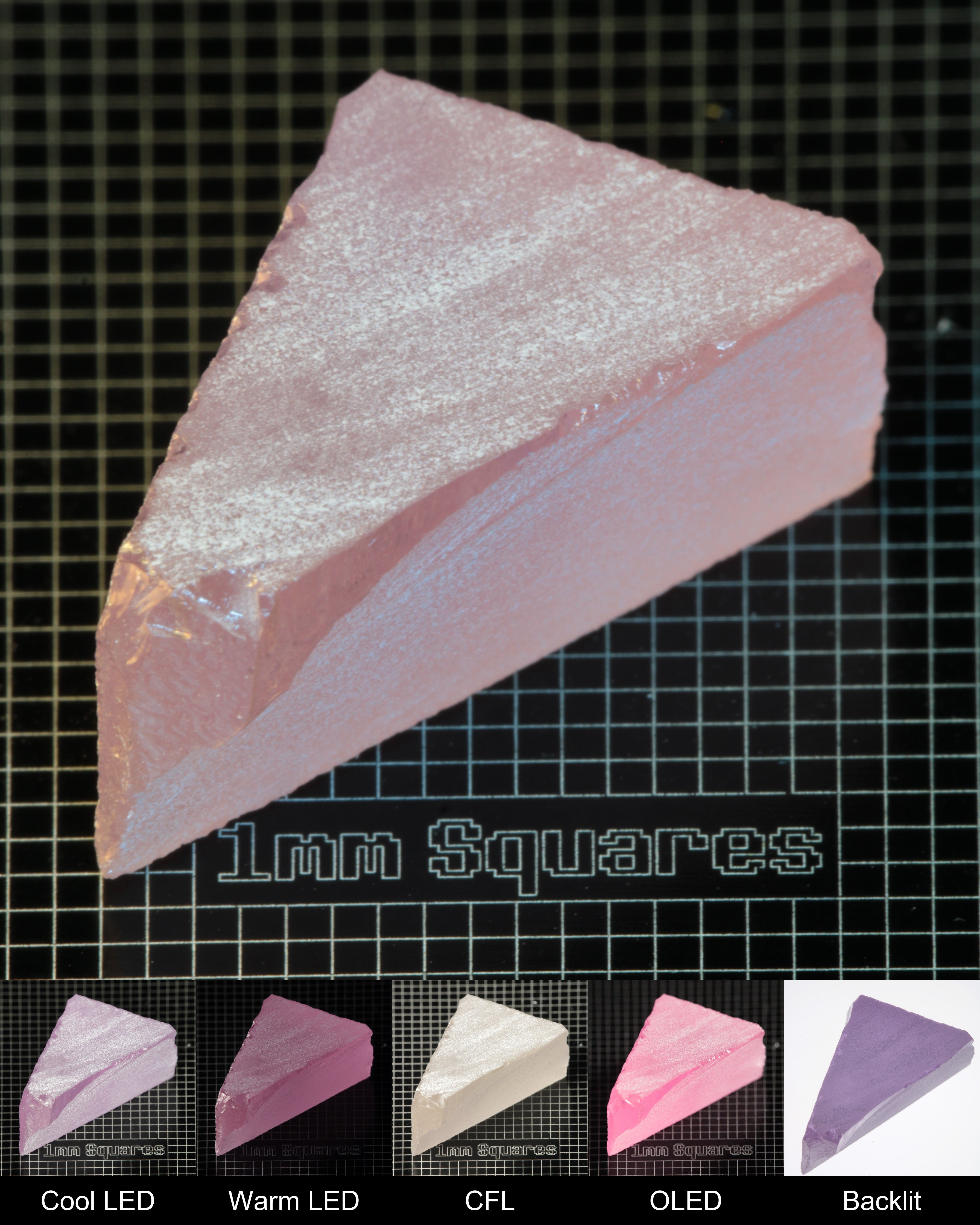 Nd:GGG Triangular Block Gem Rough Under Multiple Lights Showing the Color Change