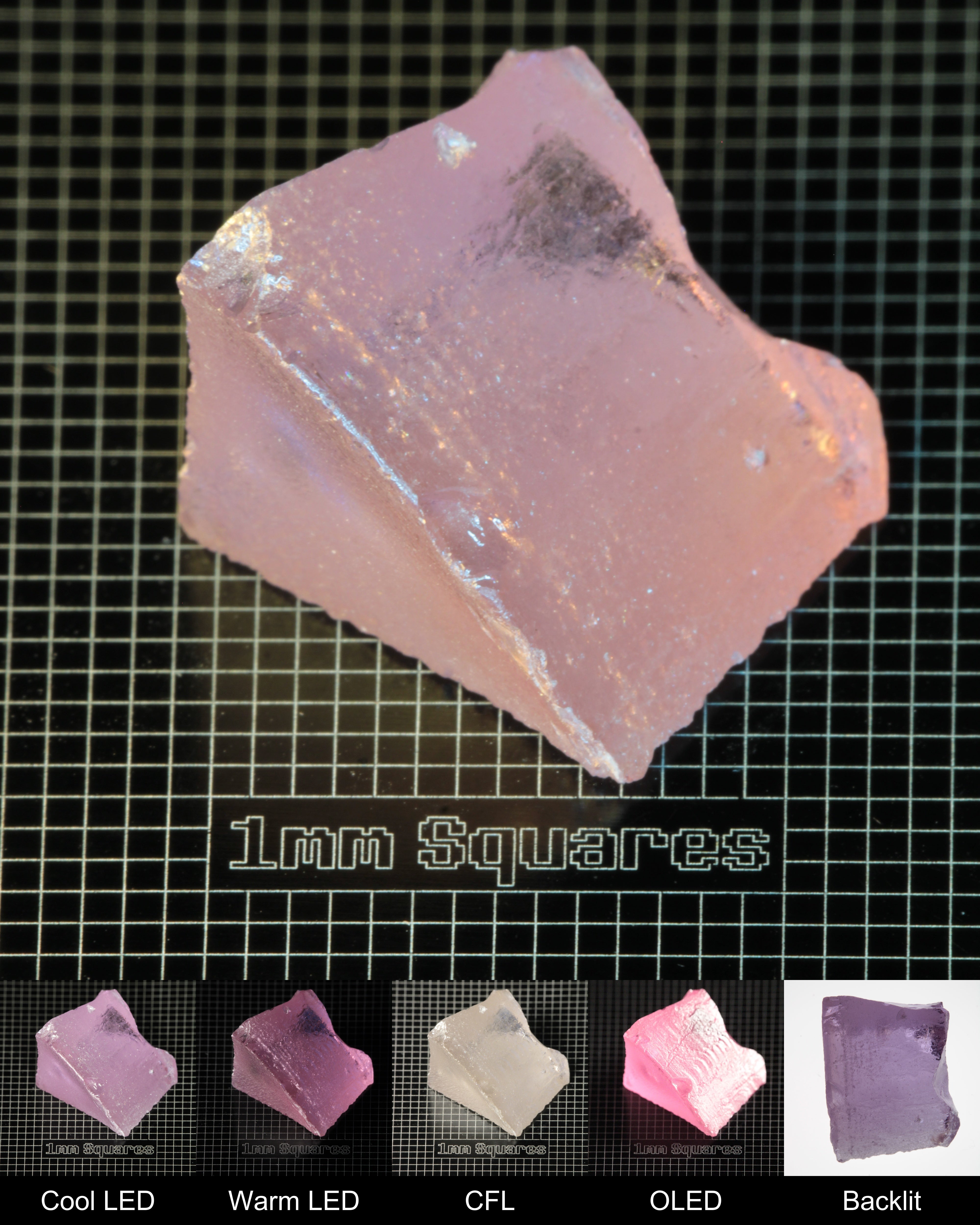 Nd:GGG Edge Block Gem Rough Under Multiple Lights Showing the Color Change