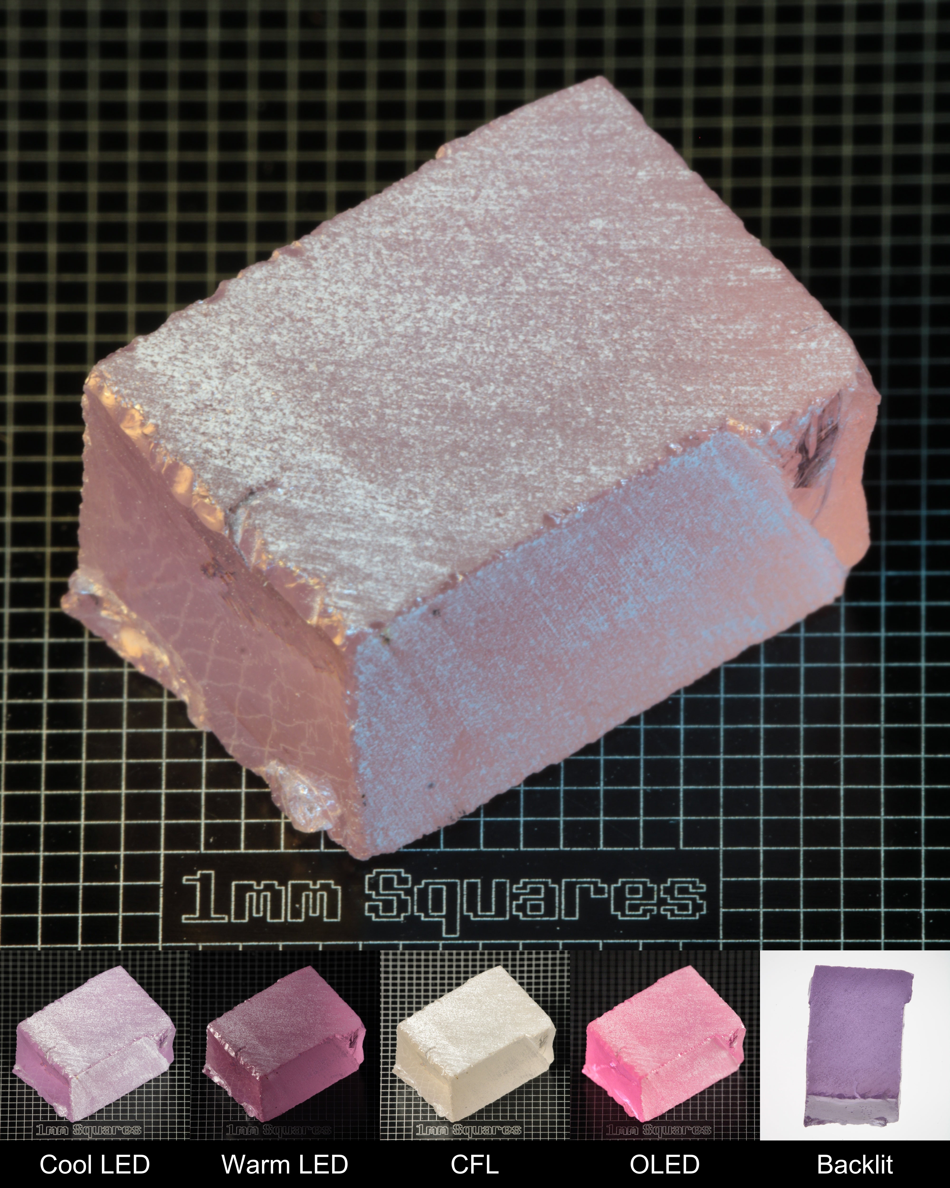 Nd:GGG Block Gem Rough Under Multiple Lights Showing the Color Change
