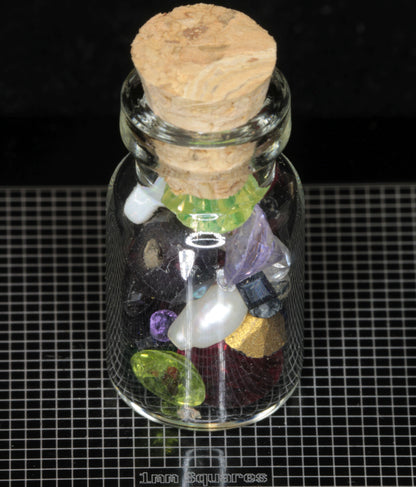 Gem Vials: Natural Kornerupine, Garnet, and Tunduru stones, mixed Popout Stones and Pearls