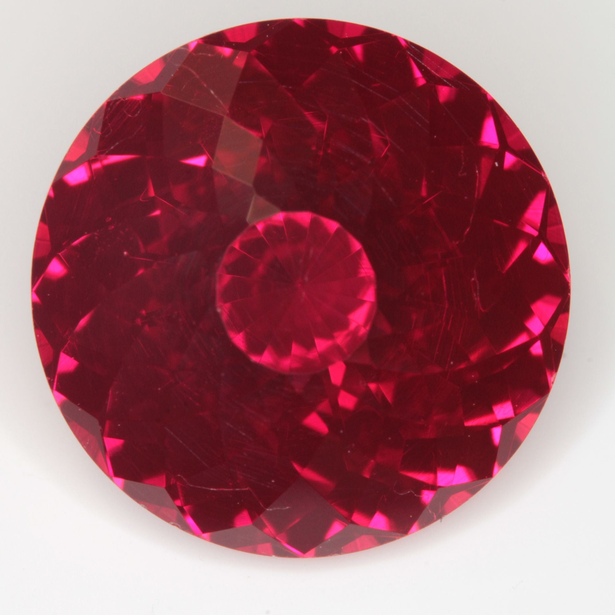 Faceted Flame Fusion Ruby Round Gemstone