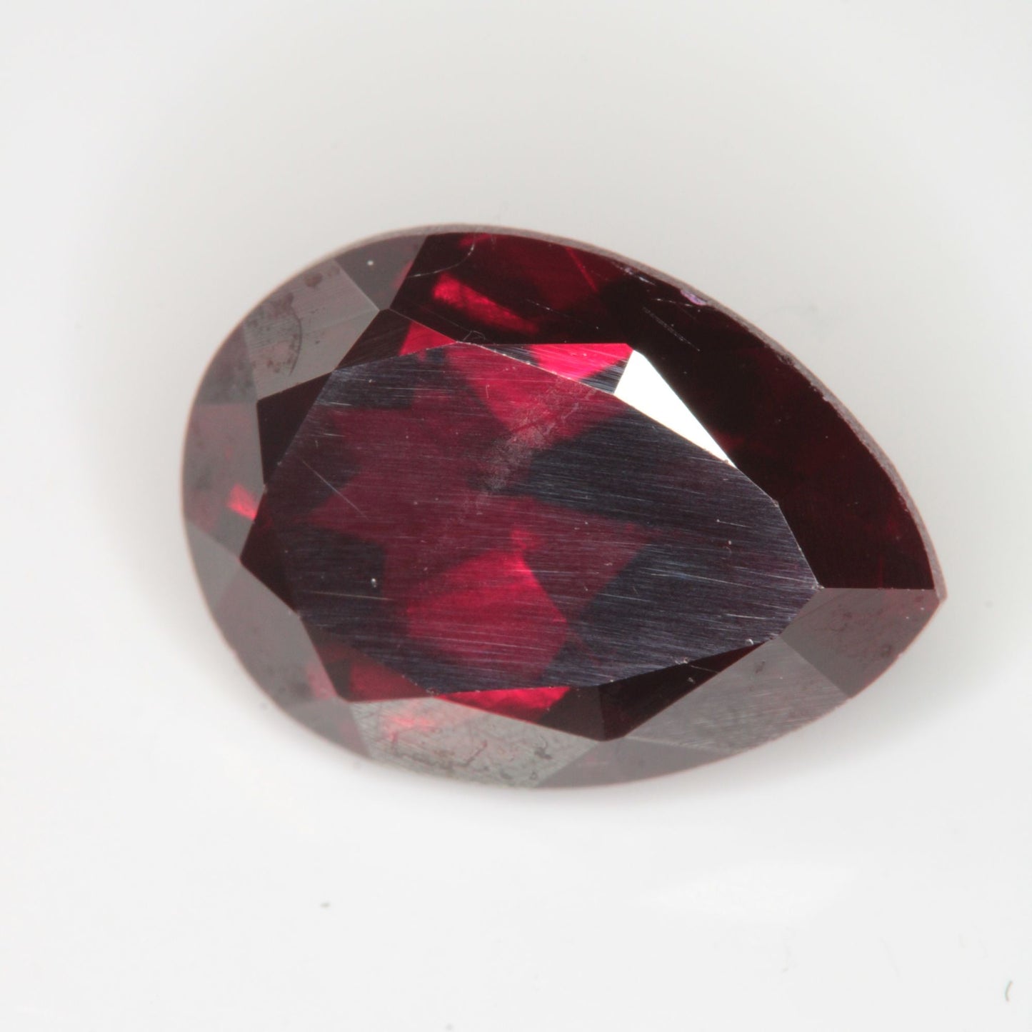 Faceted Flame Fusion Ruby Pear Gemstone