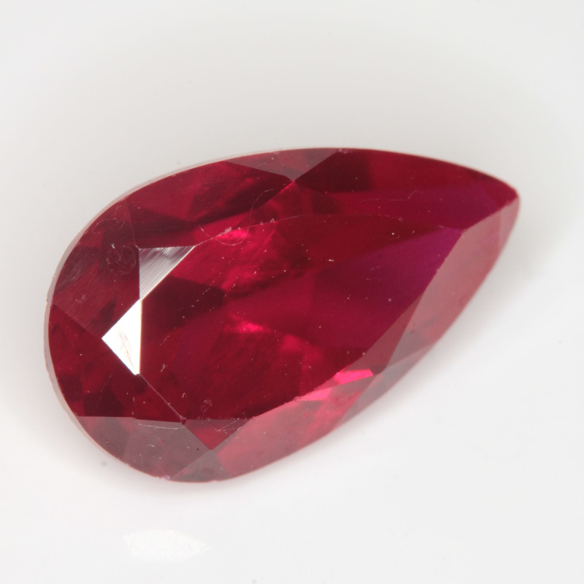 Faceted Flame Fusion Ruby Pear Gemstone