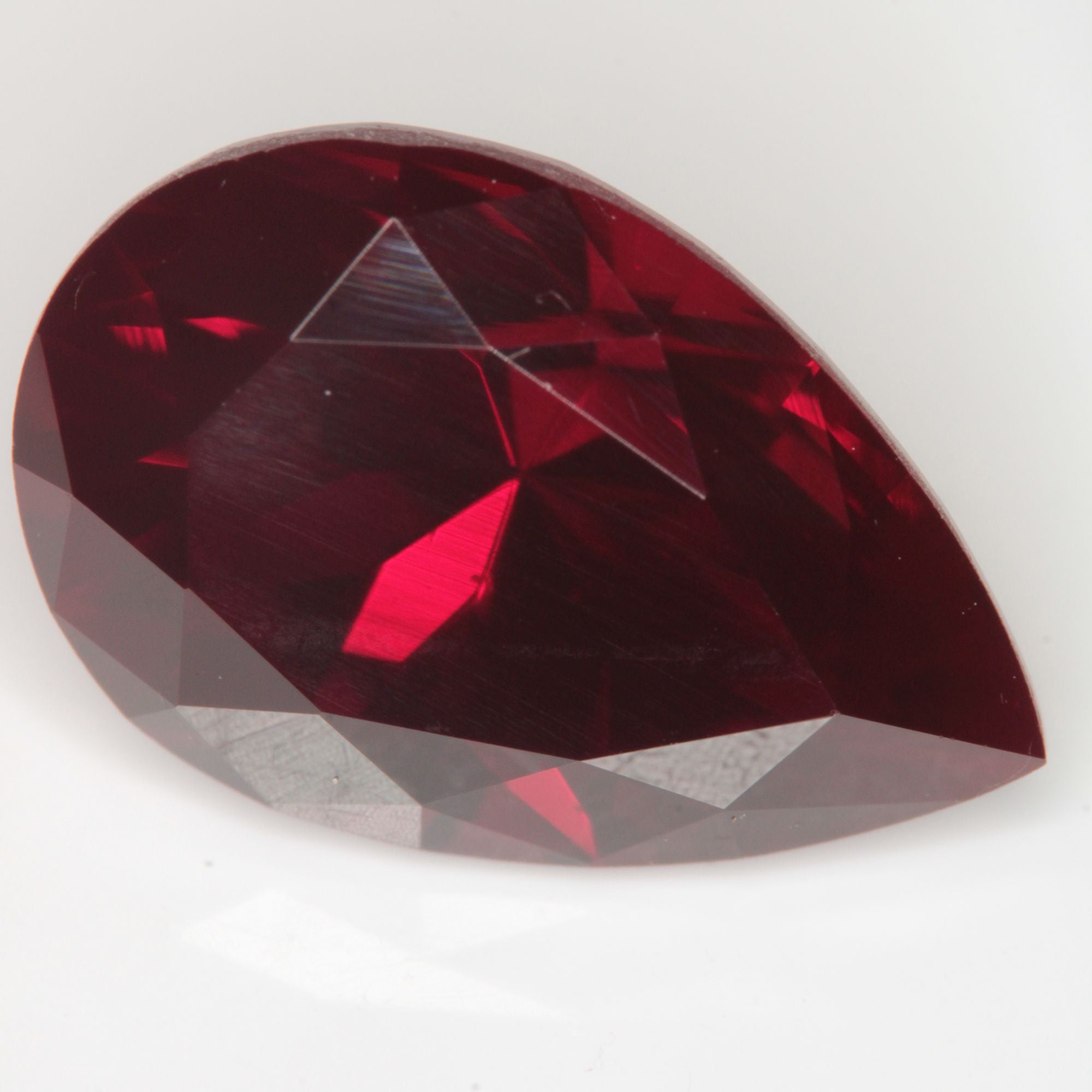 Faceted Flame Fusion Ruby Pear Gemstone