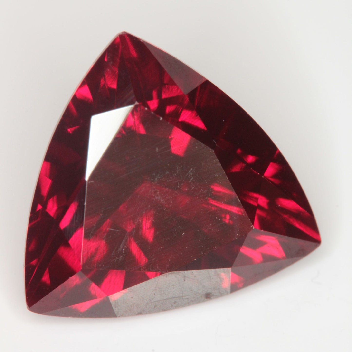 Faceted Flame Fusion Ruby Trillion Gemstone