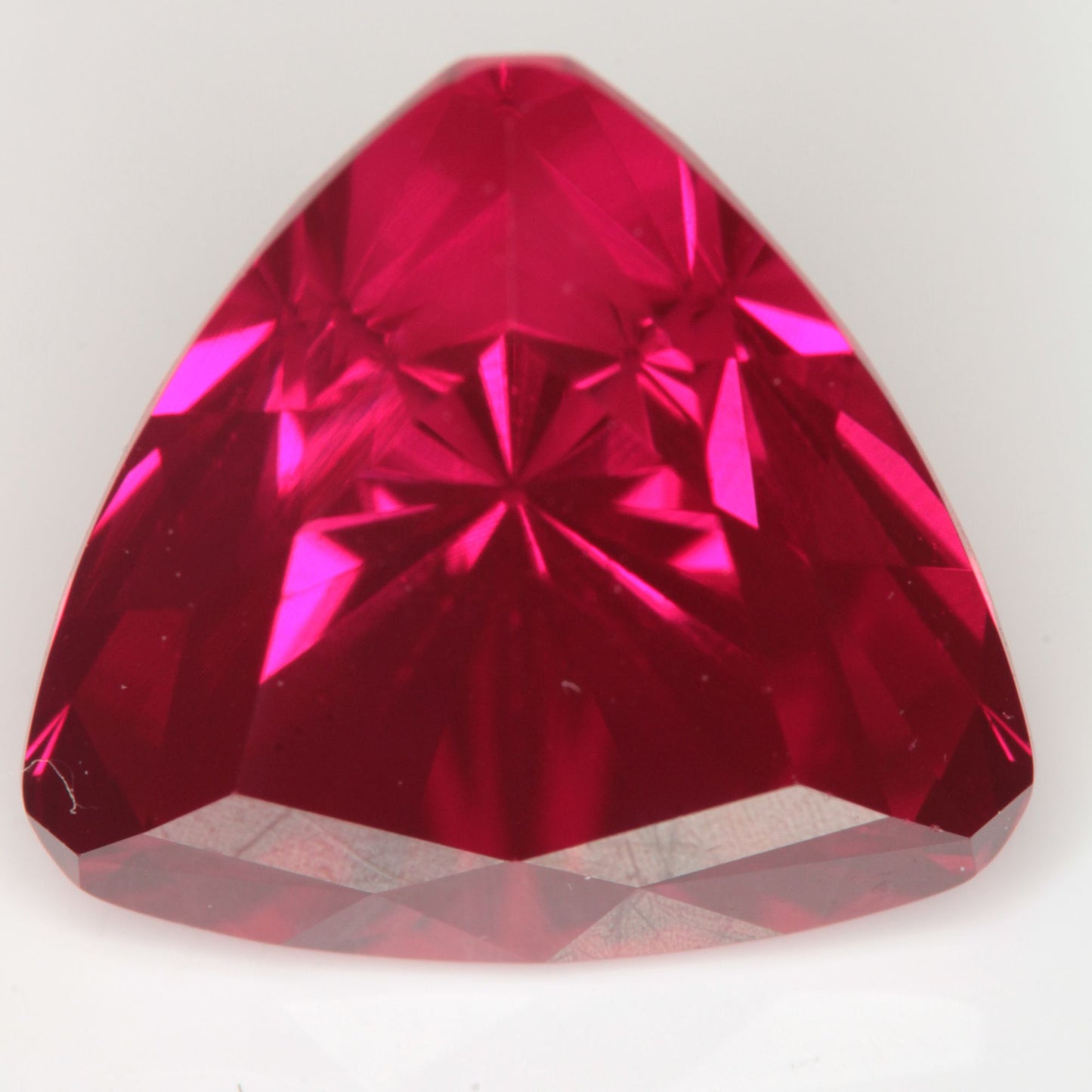 Faceted Flame Fusion Ruby Trillion Gemstone