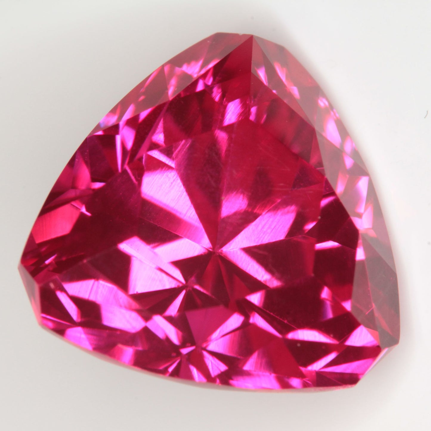 Faceted Flame Fusion Ruby Trillion Gemstone
