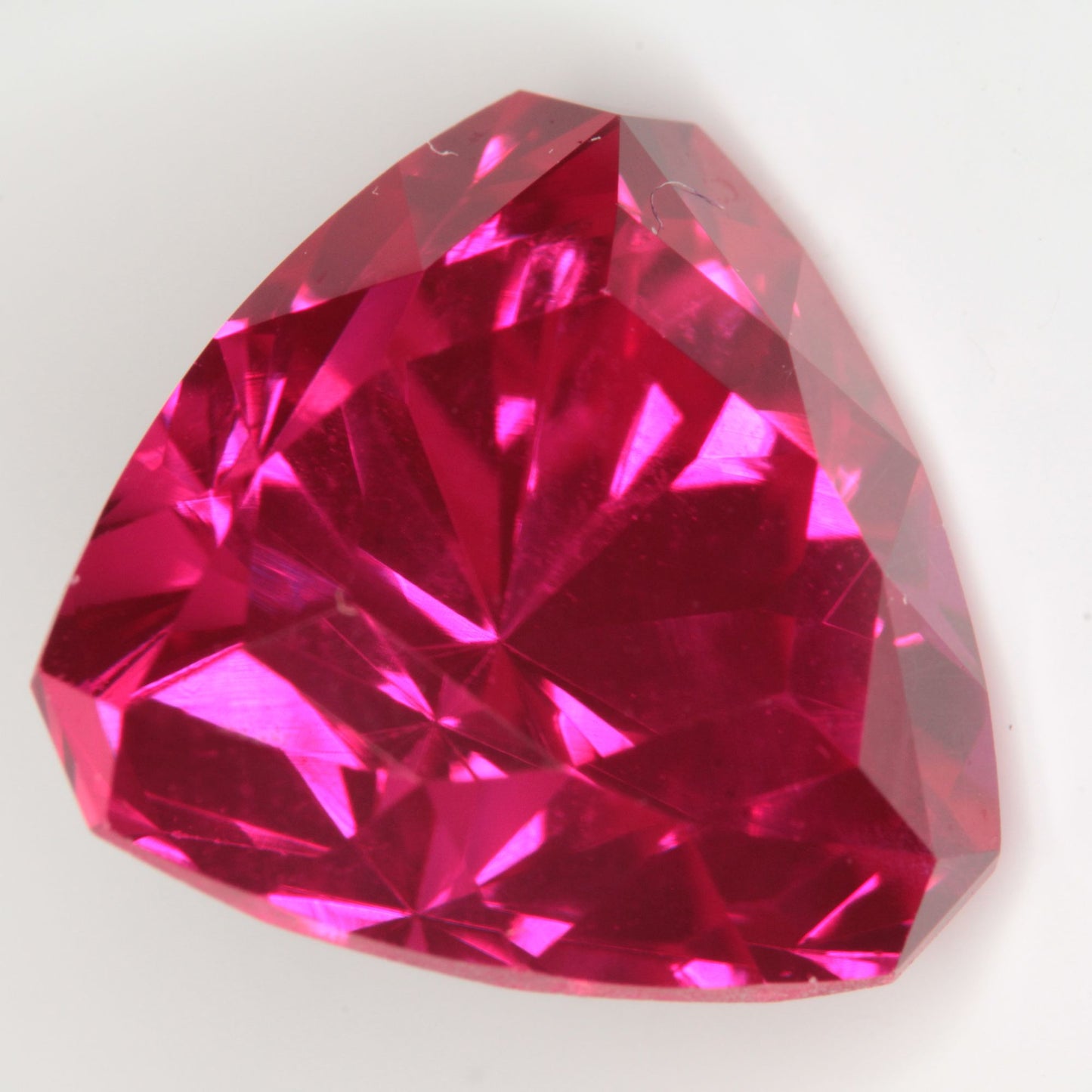 Faceted Flame Fusion Ruby Trillion Gemstone