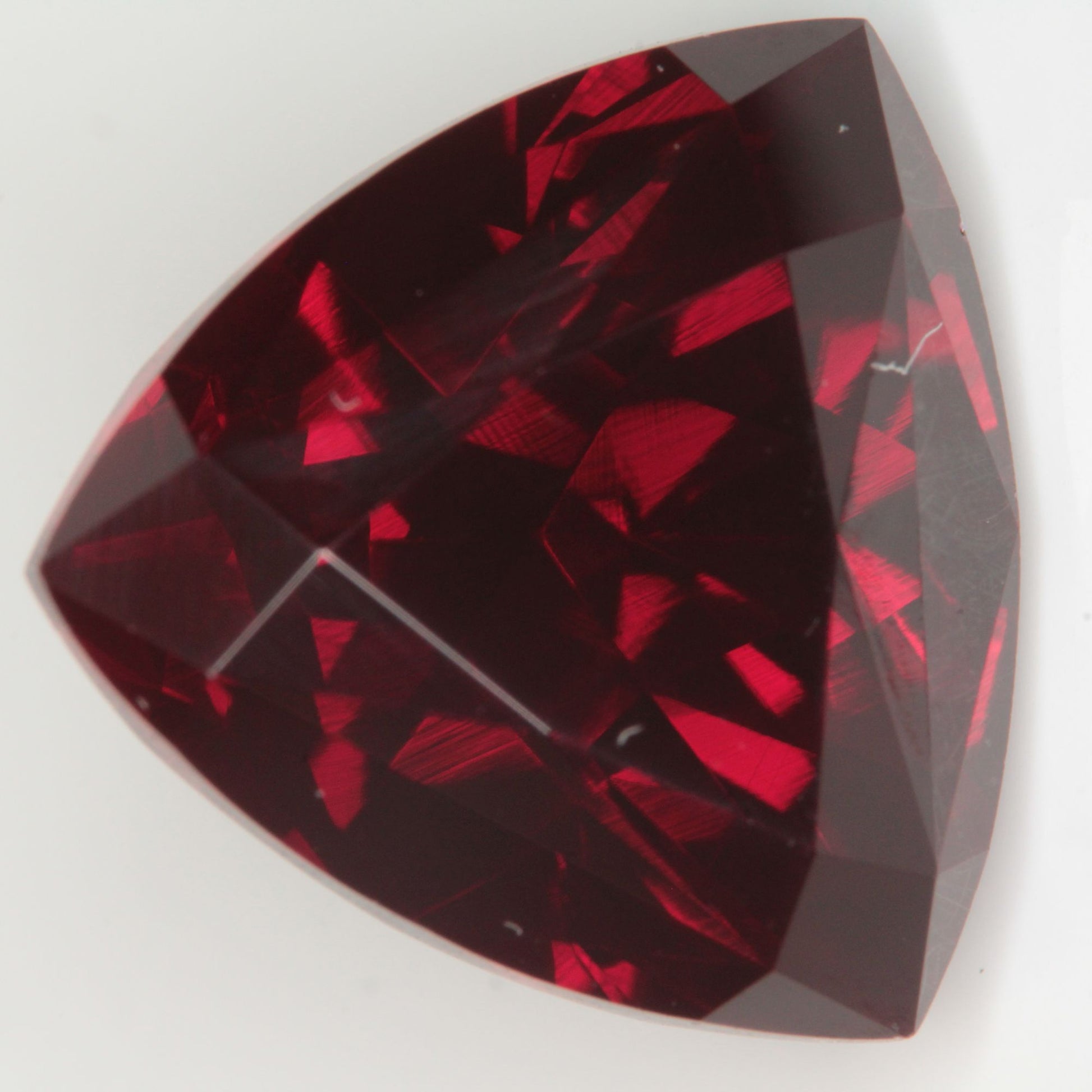 Faceted Flame Fusion Ruby Trillion Gemstone