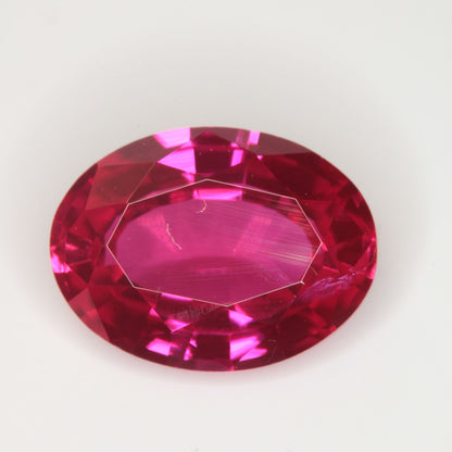 Faceted Flame Fusion Ruby Oval Gemstone