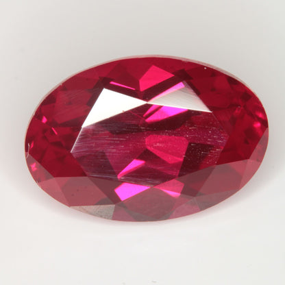 Faceted Flame Fusion Ruby Oval Gemstone