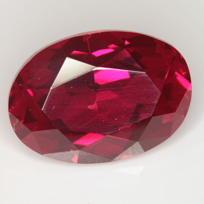 Faceted Flame Fusion Ruby Oval Gemstone