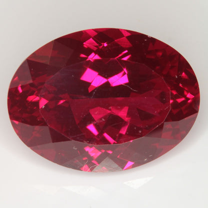 Faceted Flame Fusion Ruby Oval Gemstone