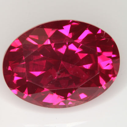 Faceted Flame Fusion Ruby Oval Gemstone