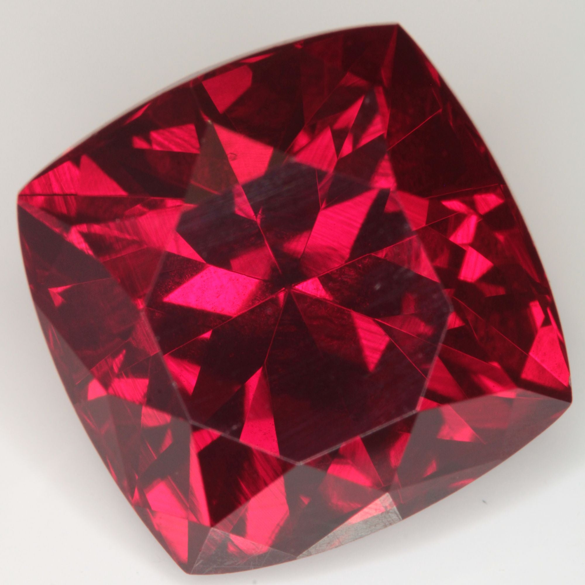 Faceted Flame Fusion Ruby Cushion Gemstone
